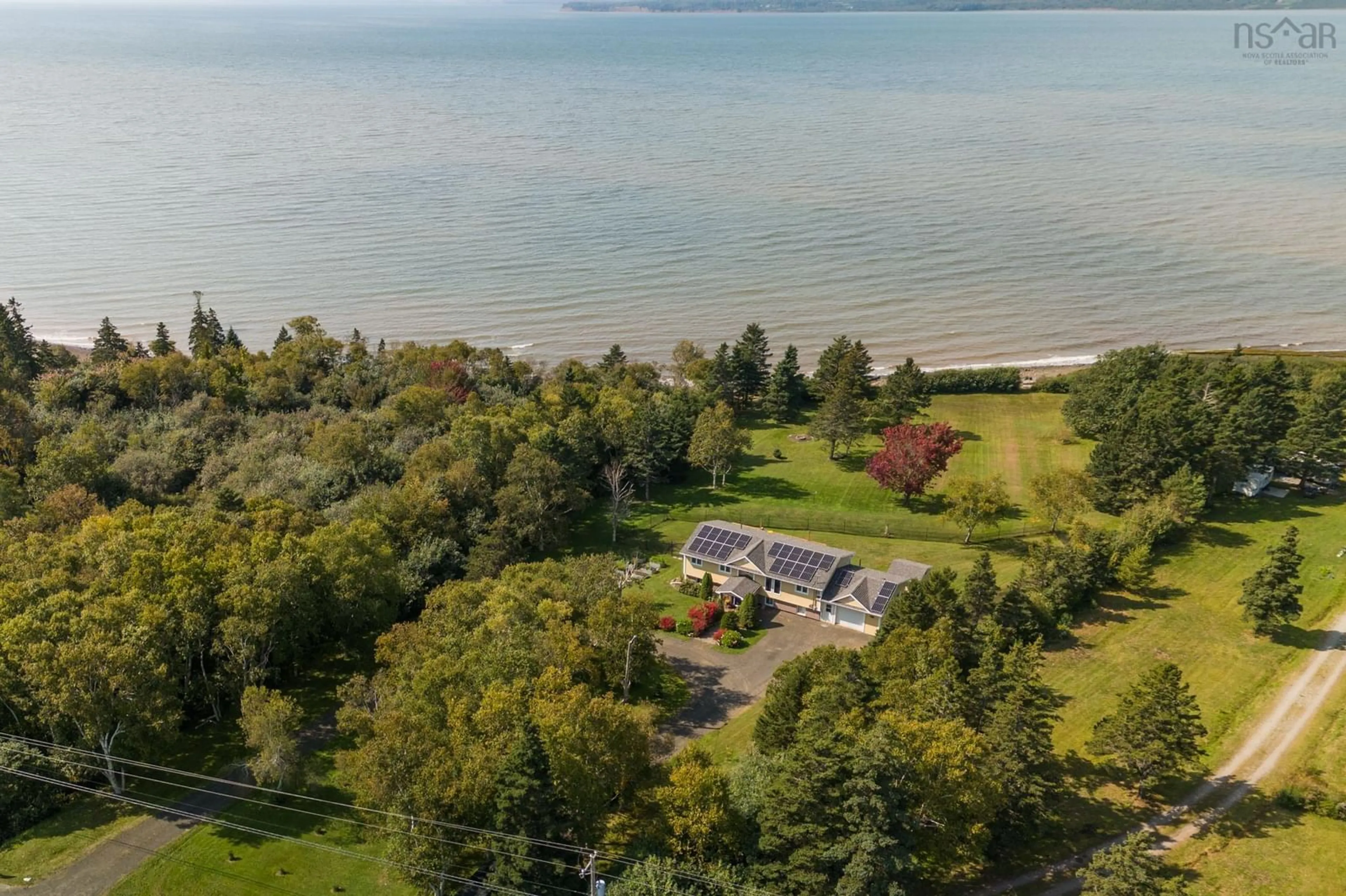 A pic from outside/outdoor area/front of a property/back of a property/a pic from drone, water/lake/river/ocean view for 8993 Highway 101, Brighton Nova Scotia B0V 1A0