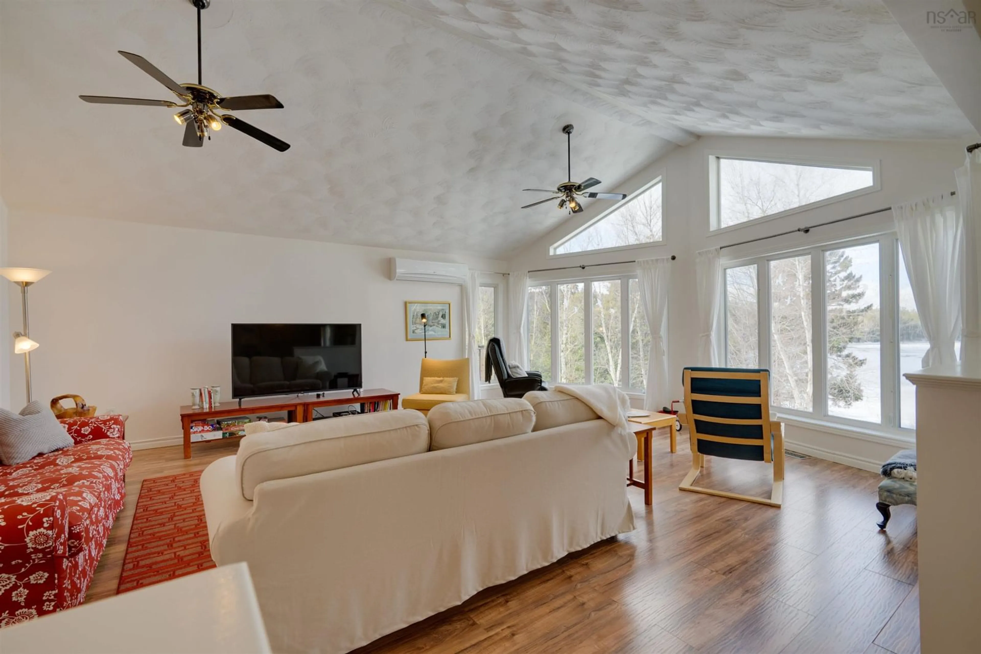 Living room with furniture, wood/laminate floor for 52 Jefferson Rd, Laconia Nova Scotia B4V 5W5
