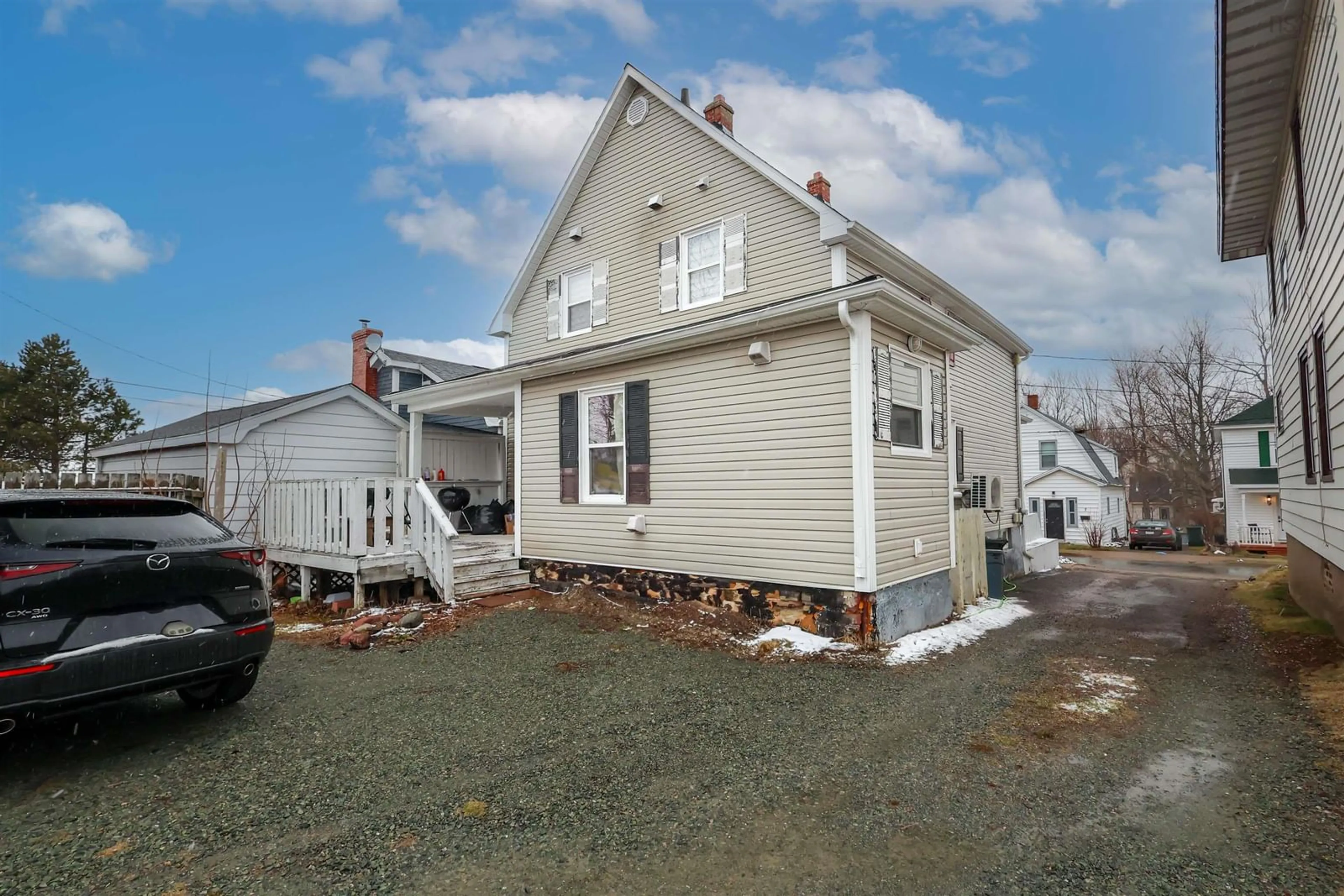 Home with vinyl exterior material, street for 8 Campbell St, Sydney Nova Scotia B1P 1E9