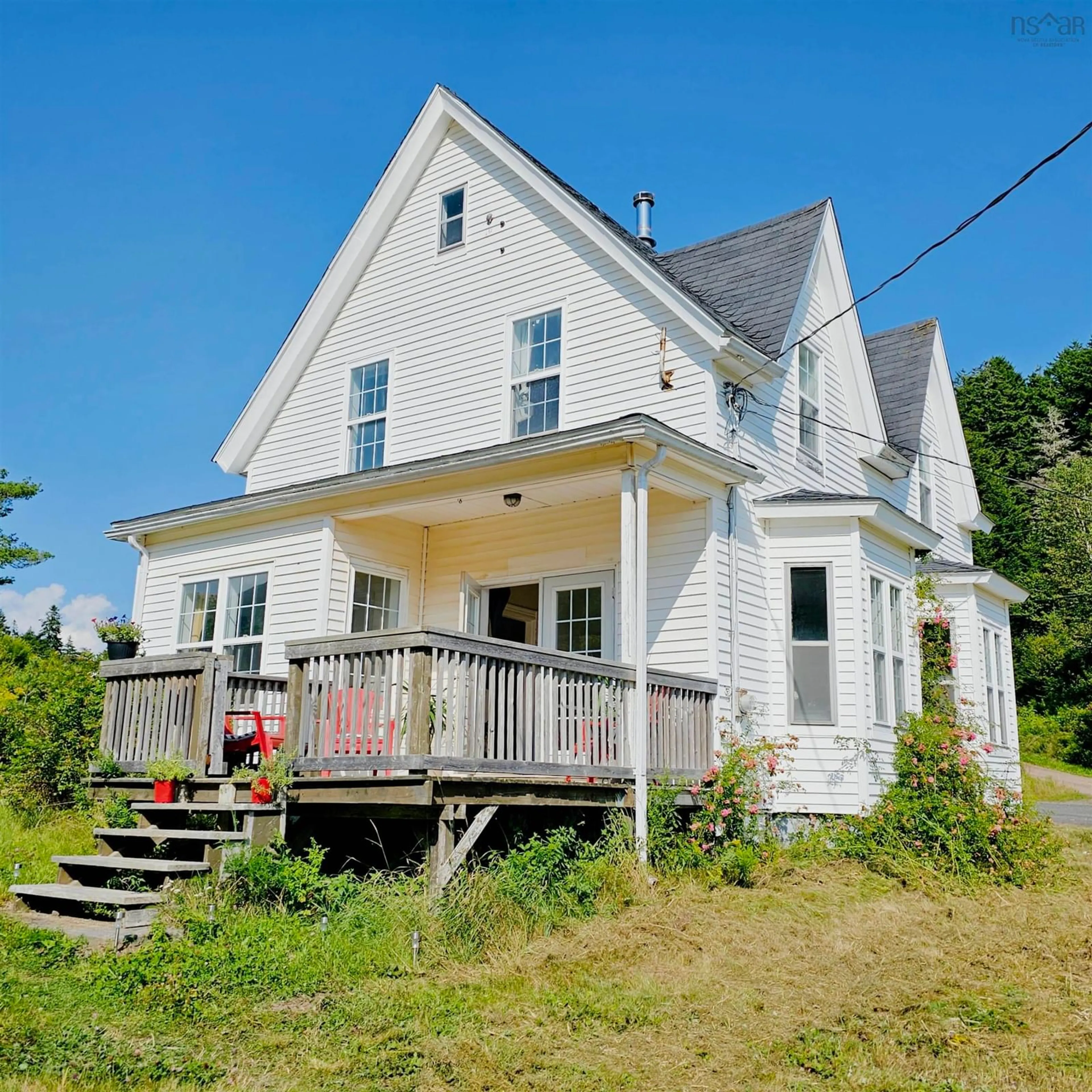 Home with vinyl exterior material, street for 212 Brook Rd, Port Greville Nova Scotia B0M 1T0
