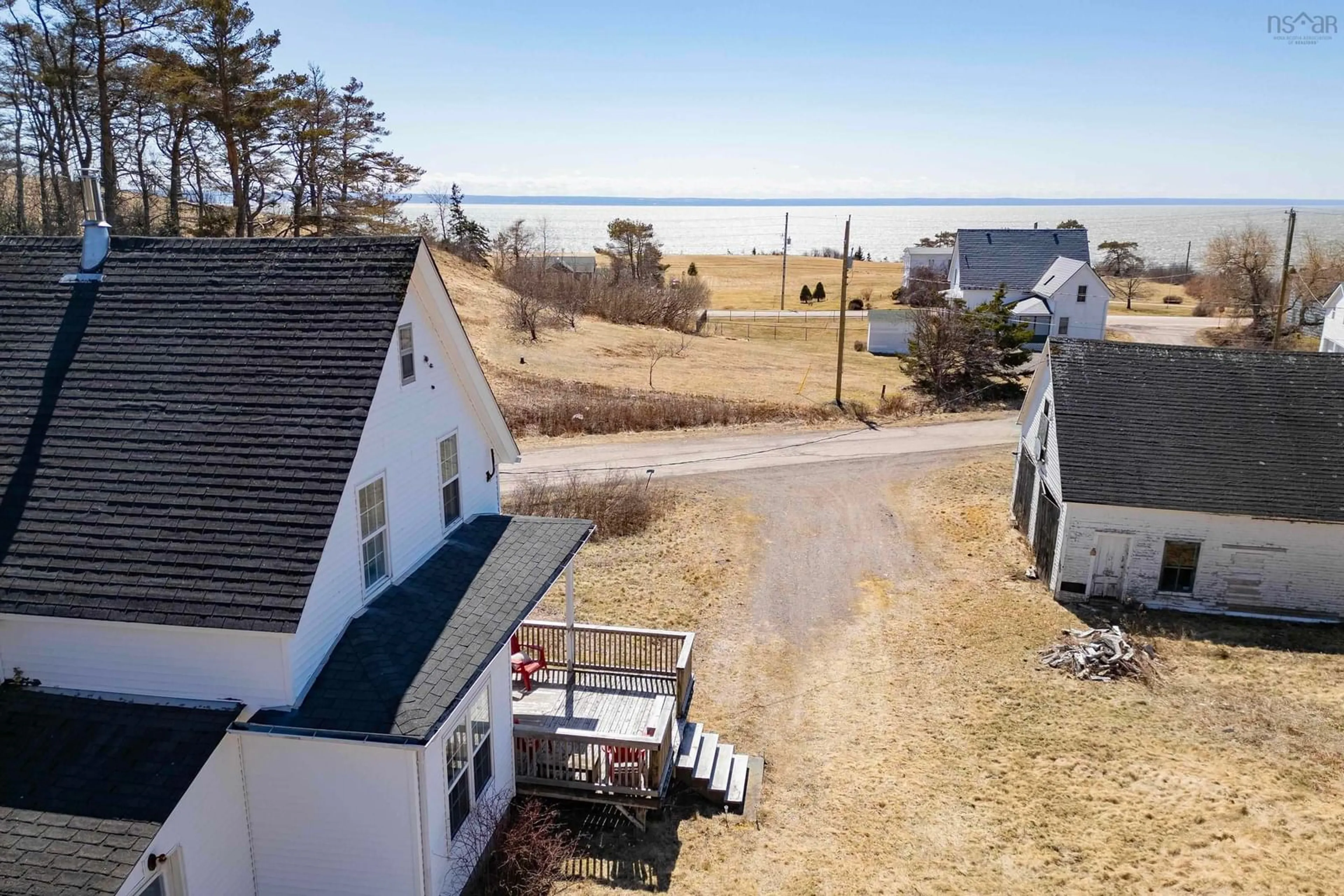 A pic from outside/outdoor area/front of a property/back of a property/a pic from drone, water/lake/river/ocean view for 212 Brook Rd, Port Greville Nova Scotia B0M 1T0