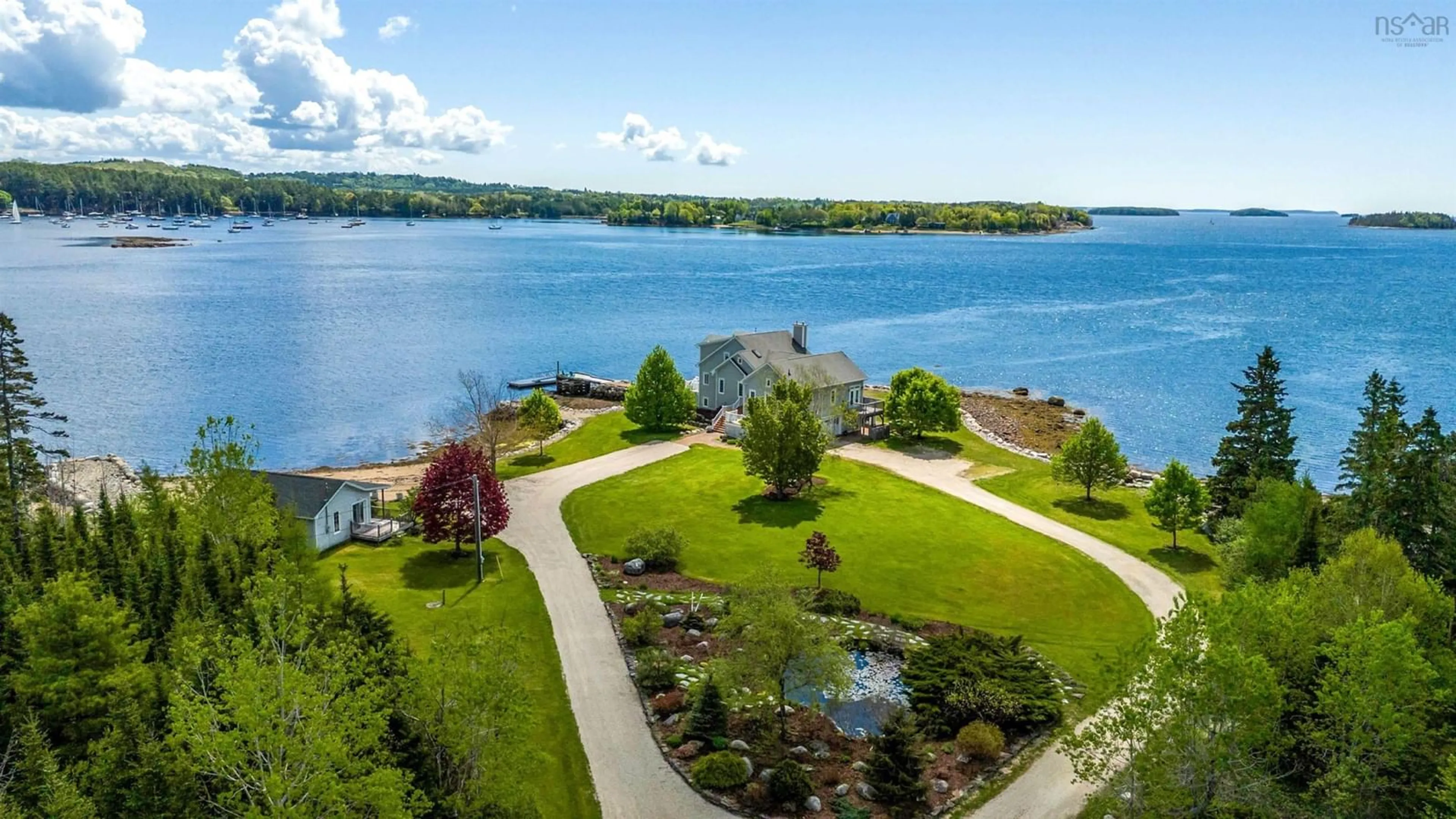 A pic from outside/outdoor area/front of a property/back of a property/a pic from drone, water/lake/river/ocean view for 30 Seabreeze Lane, Chester Basin Nova Scotia B0J 1K0
