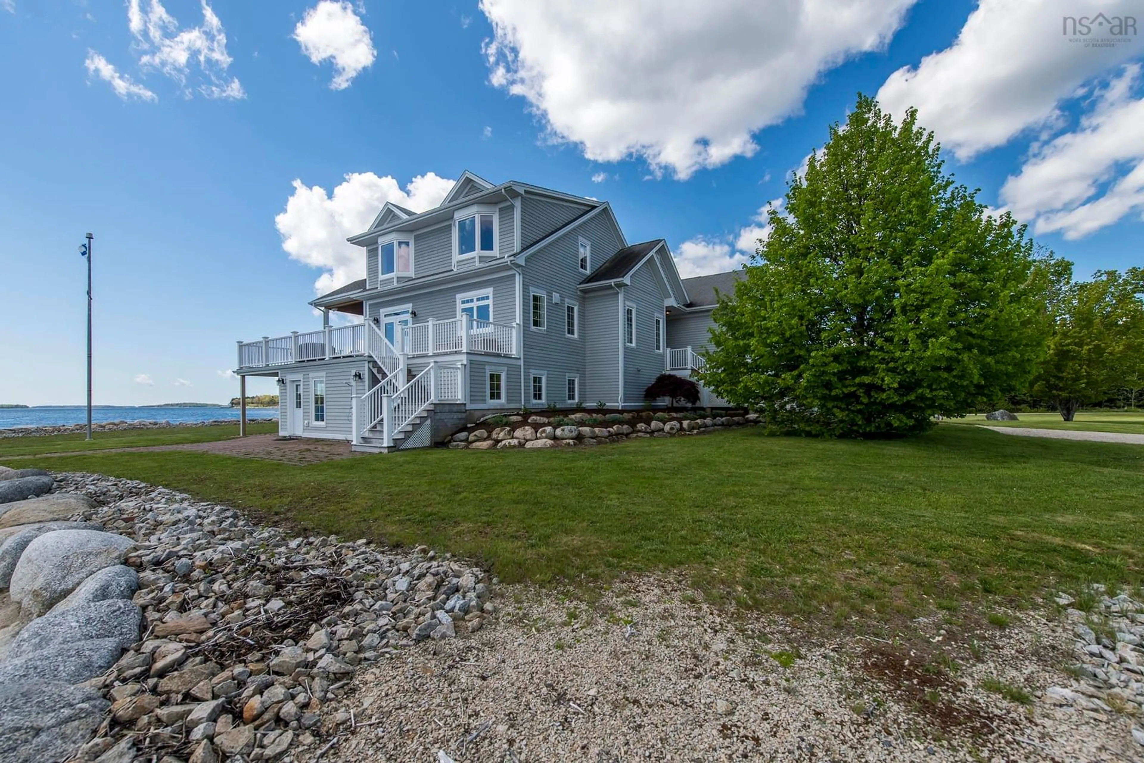 A pic from outside/outdoor area/front of a property/back of a property/a pic from drone, water/lake/river/ocean view for 30 Seabreeze Lane, Chester Basin Nova Scotia B0J 1K0