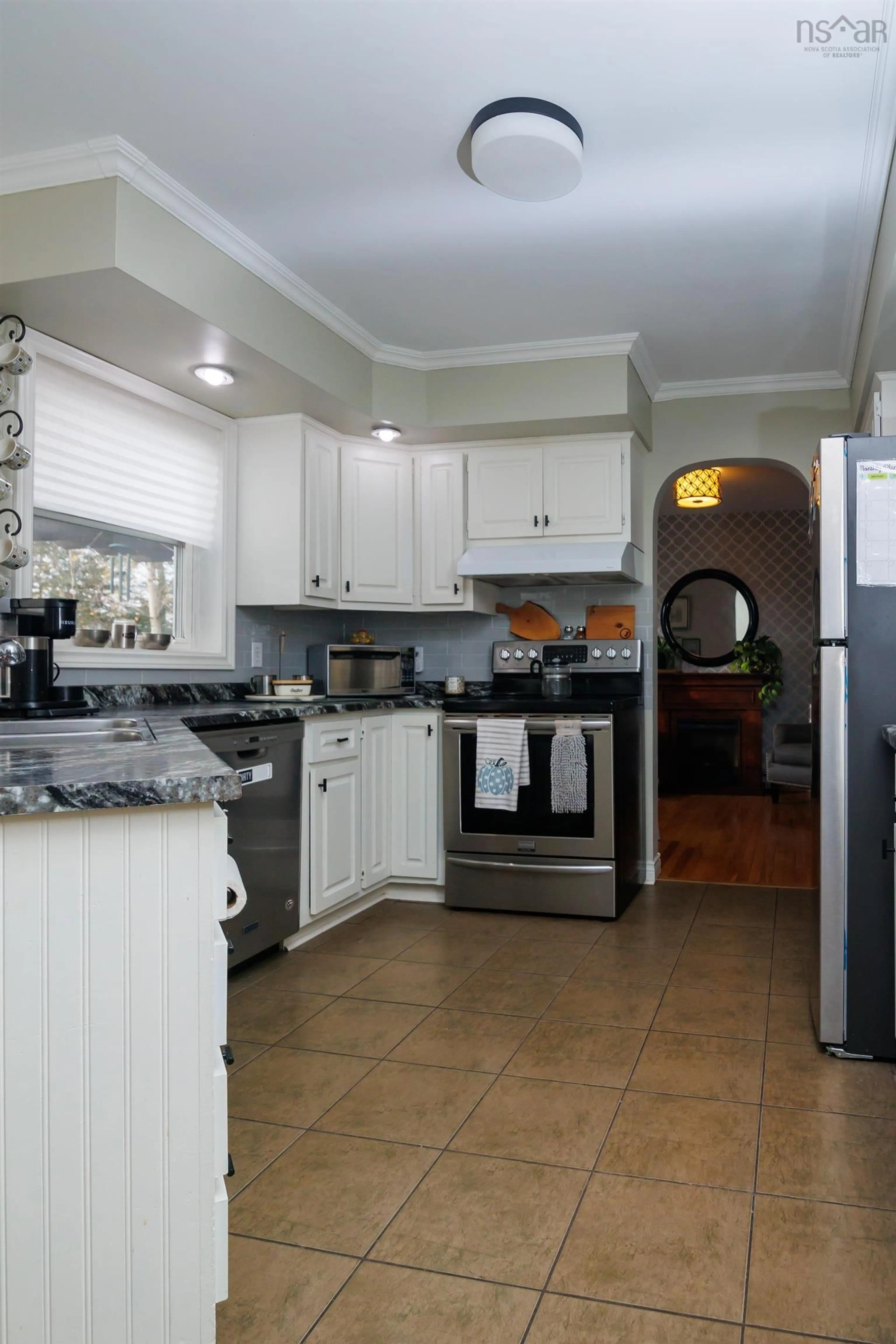 Kitchen with laundary machines, ceramic/tile floor for 191 Teviot Pl, Valley Nova Scotia B6L 4L1