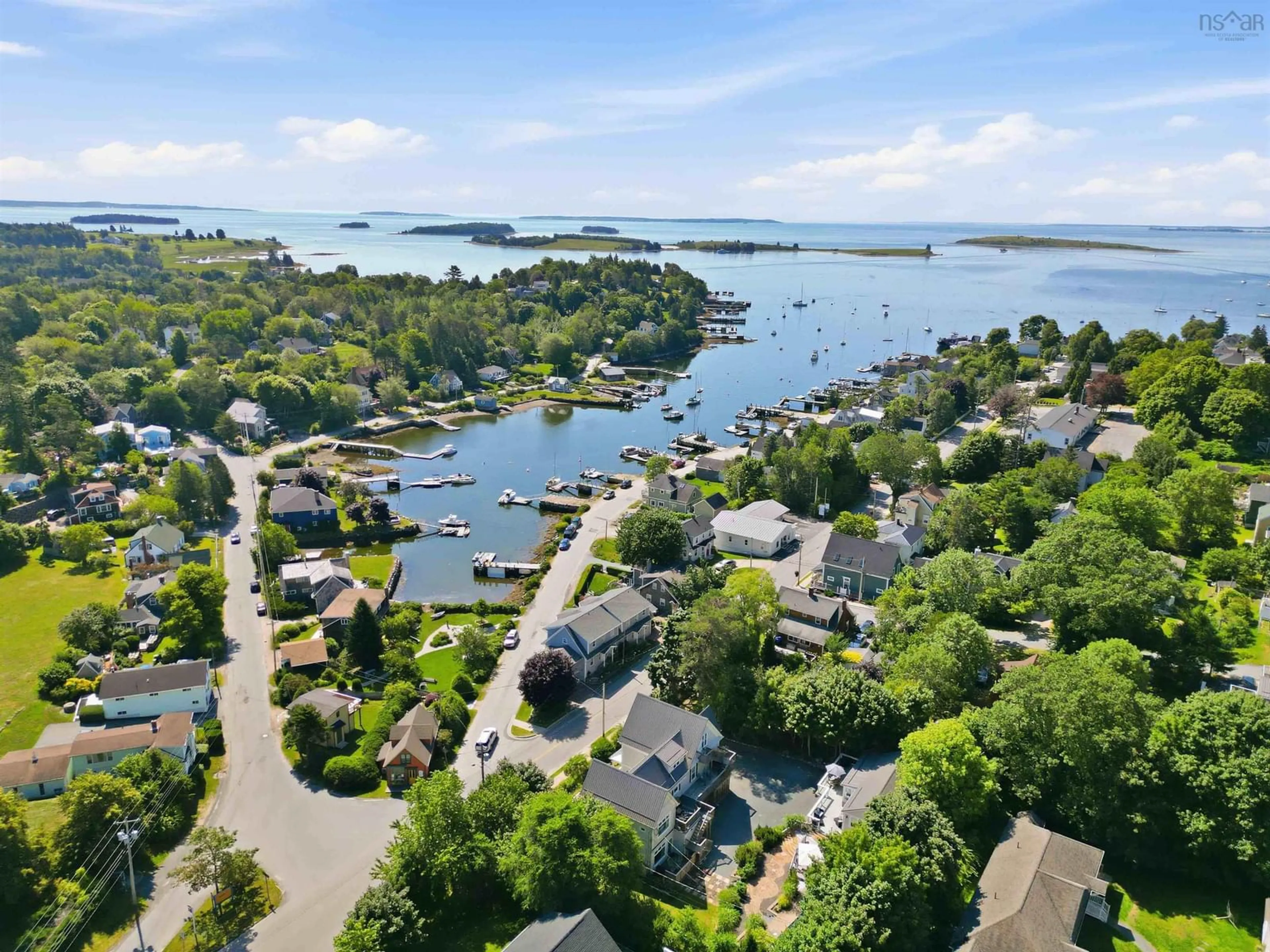A pic from outside/outdoor area/front of a property/back of a property/a pic from drone, water/lake/river/ocean view for 121 Duke St, Chester Nova Scotia B0J 1J0