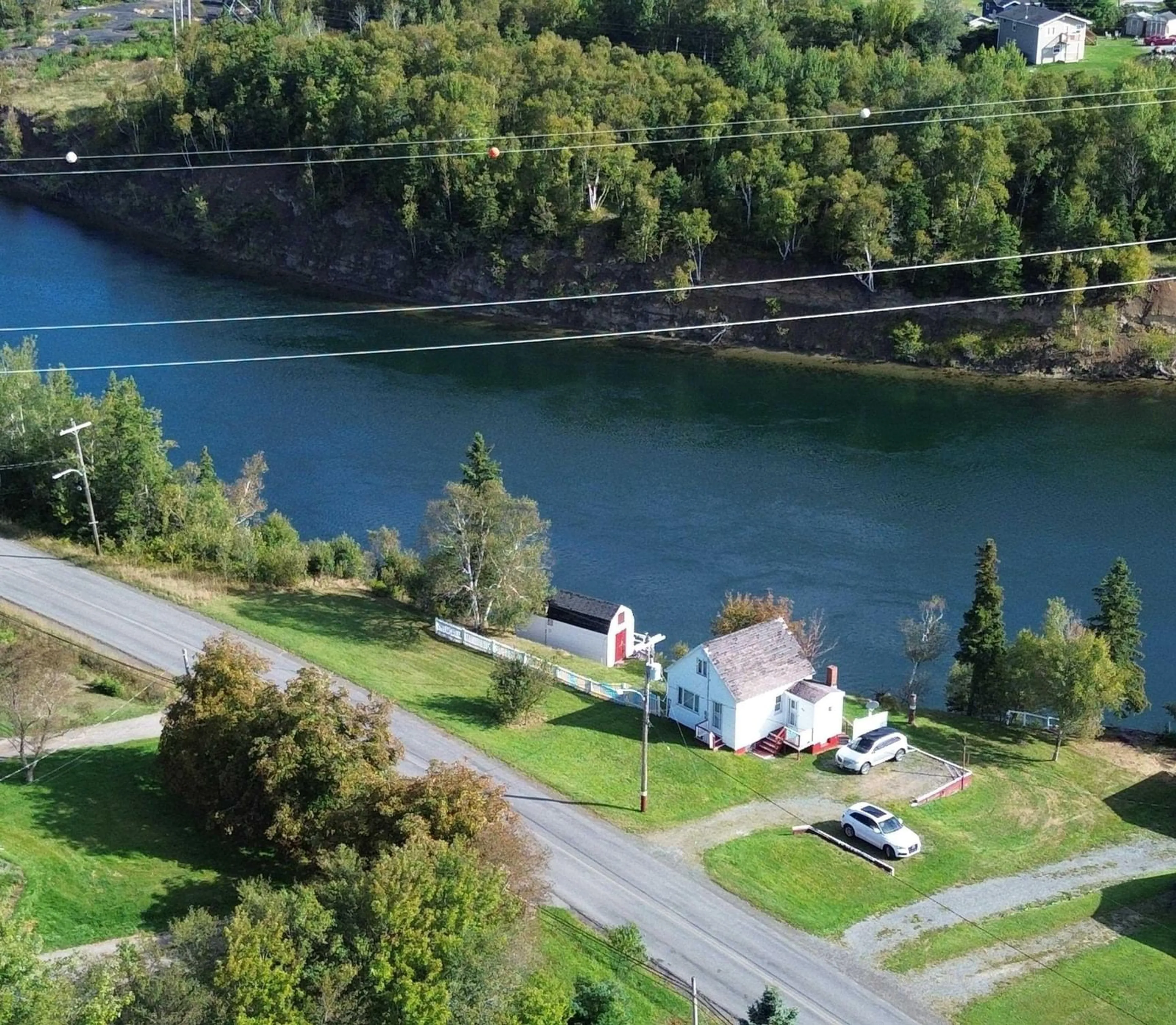 A pic from outside/outdoor area/front of a property/back of a property/a pic from drone, water/lake/river/ocean view for 48 Point Aconi Rd, Point Aconi Nova Scotia B1Y 2M8