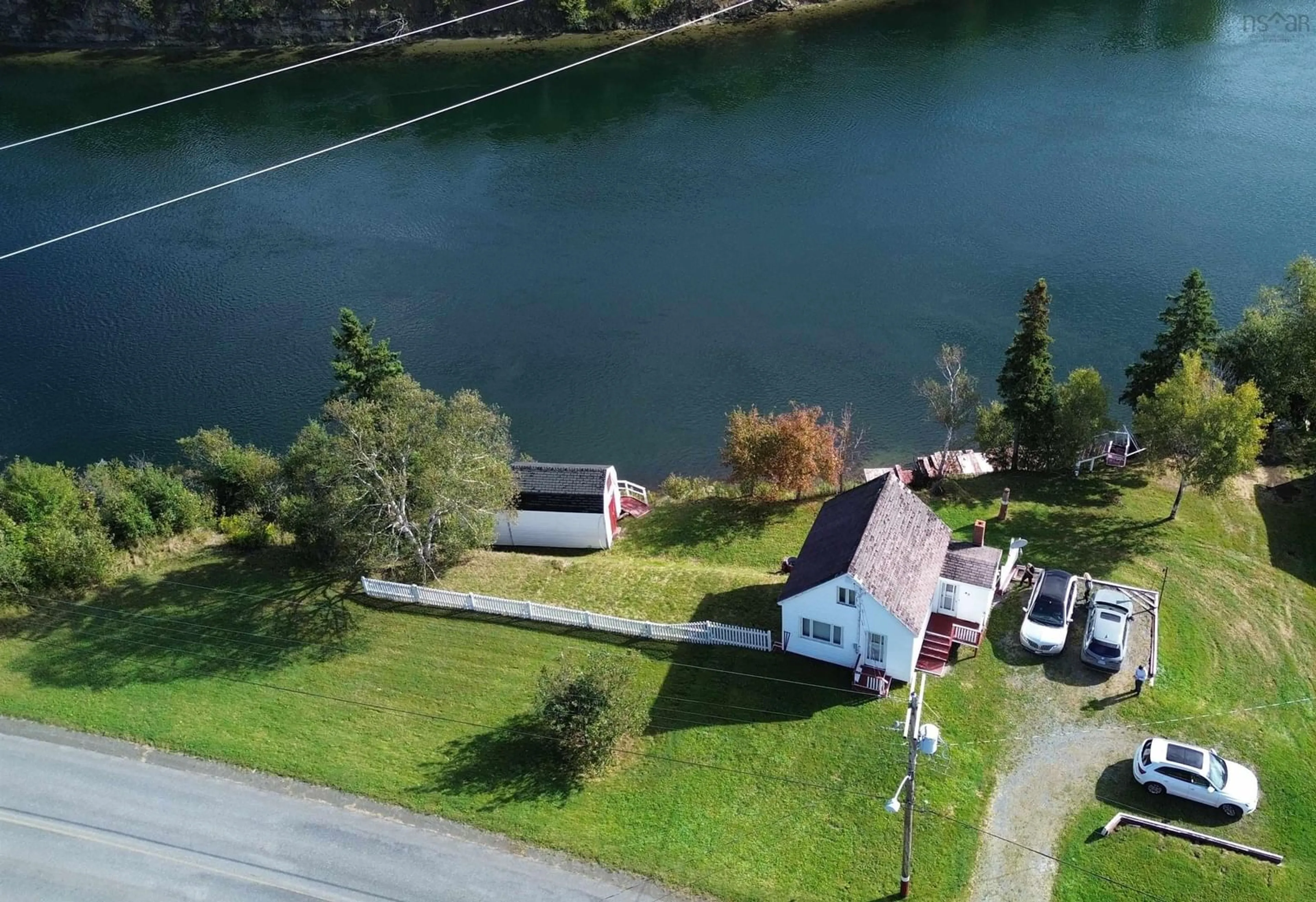 A pic from outside/outdoor area/front of a property/back of a property/a pic from drone, water/lake/river/ocean view for 48 Point Aconi Rd, Point Aconi Nova Scotia B1Y 2M8