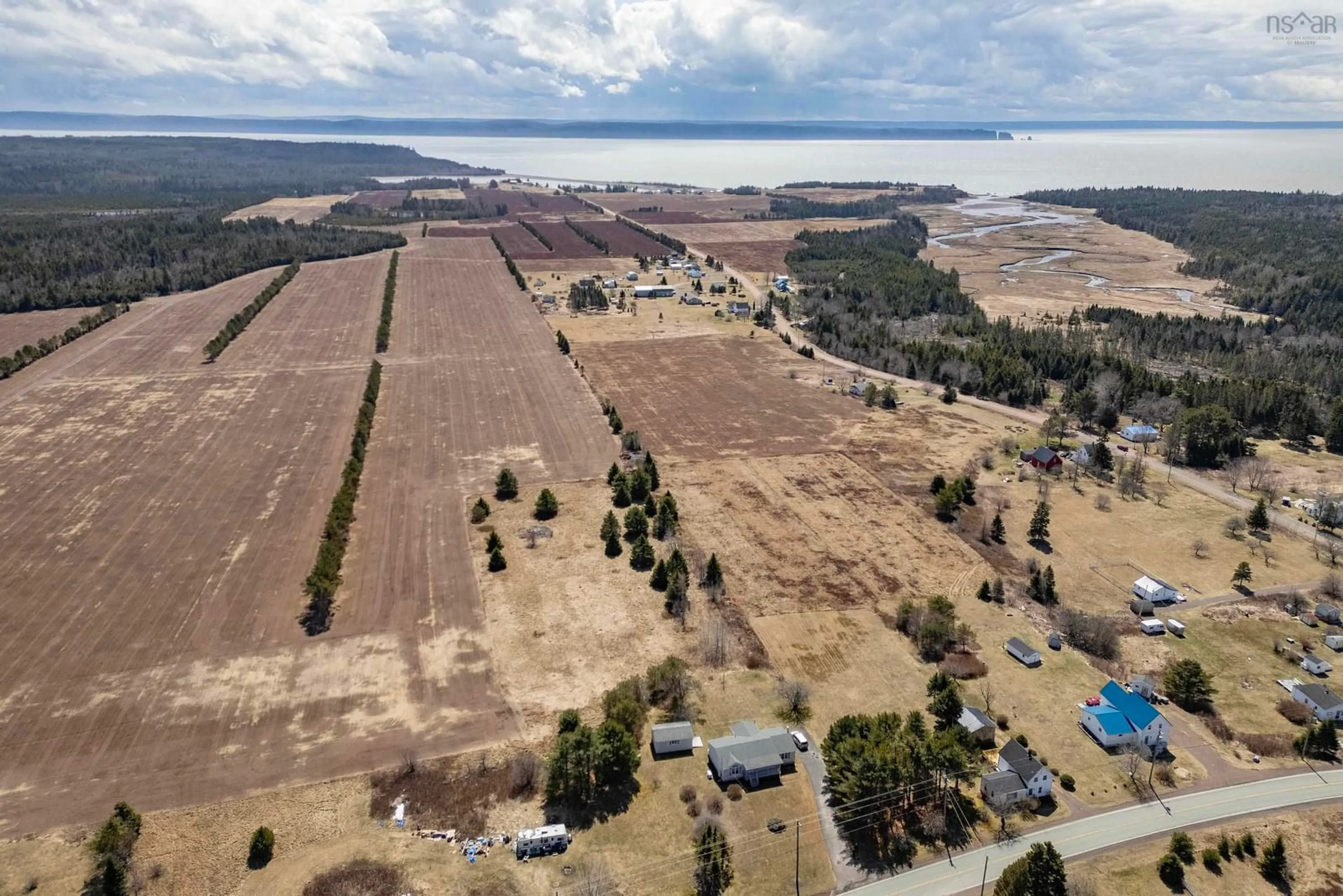 A pic from outside/outdoor area/front of a property/back of a property/a pic from drone, water/lake/river/ocean view for 10216 Highway 209, Diligent River Nova Scotia B0M 1T0