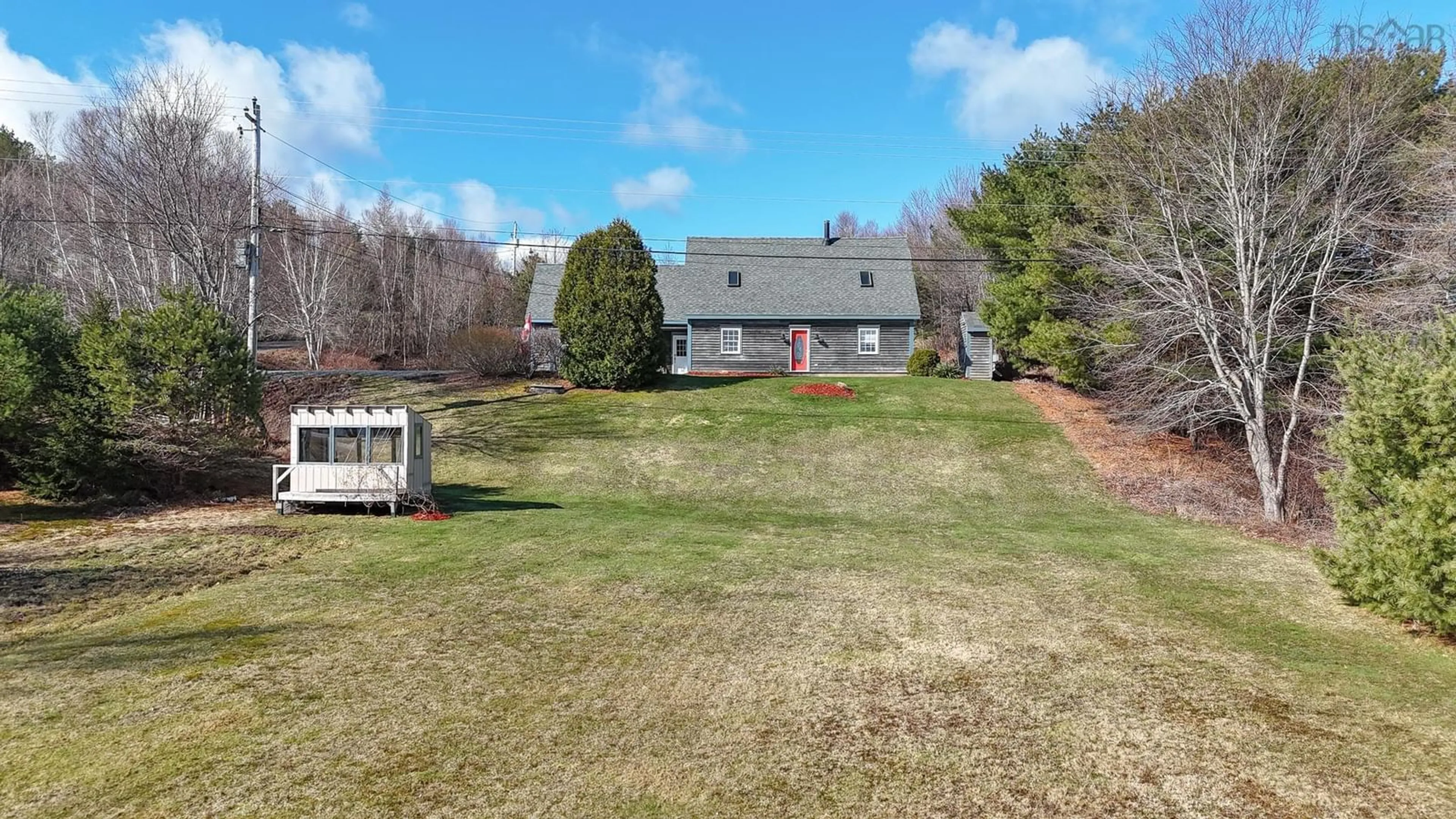 A pic from outside/outdoor area/front of a property/back of a property/a pic from drone, water/lake/river/ocean view for 12 Charles William Dr, West Lahave Nova Scotia B0R 1C0