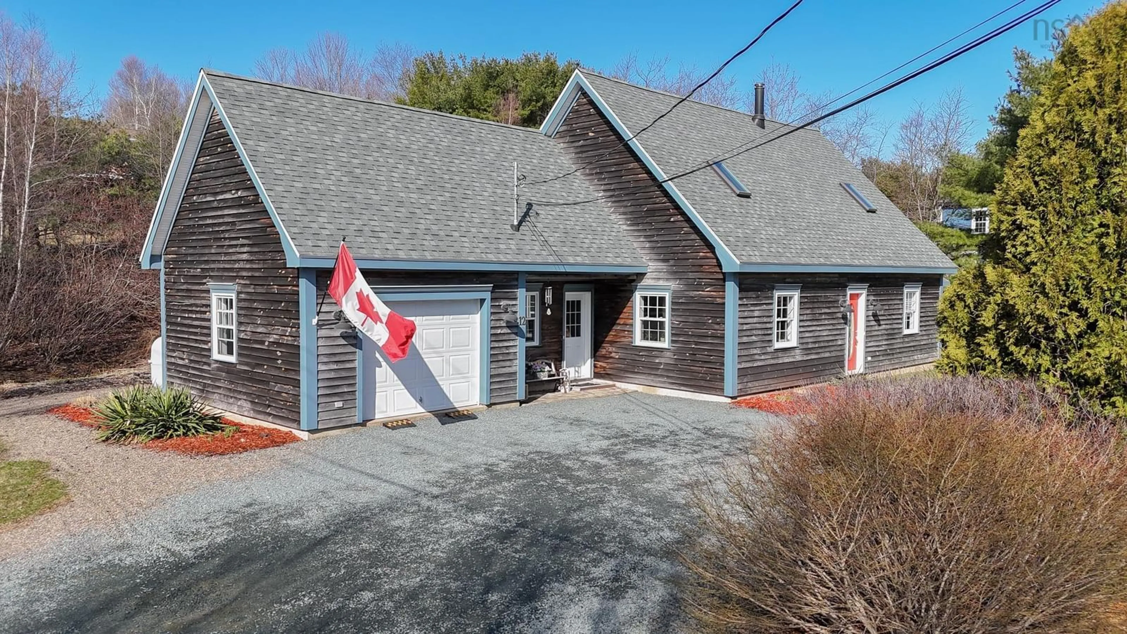 A pic from outside/outdoor area/front of a property/back of a property/a pic from drone, street for 12 Charles William Dr, West Lahave Nova Scotia B0R 1C0