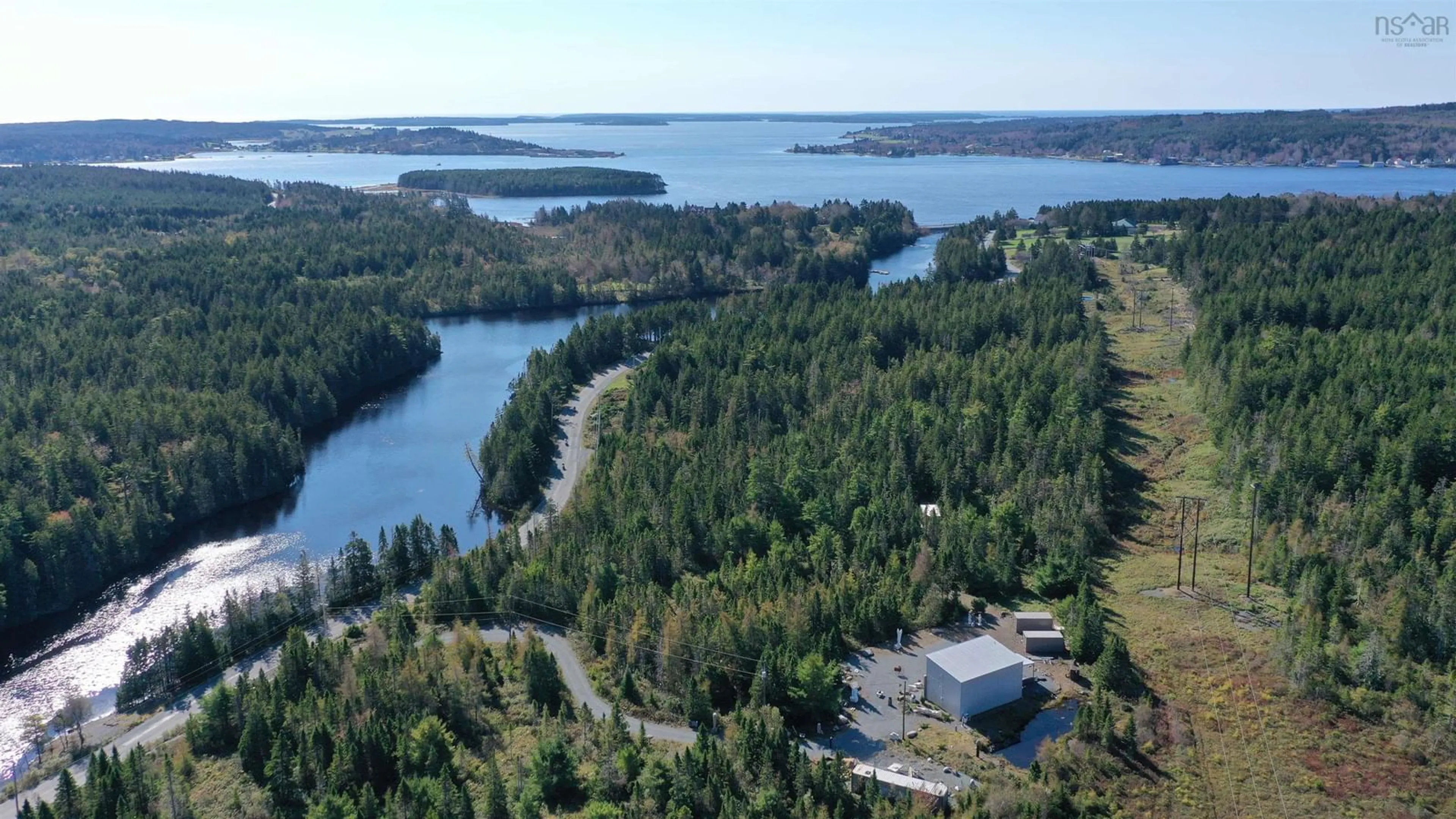 A pic from outside/outdoor area/front of a property/back of a property/a pic from drone, water/lake/river/ocean view for 520 Indian Path Rd, East Lahave Nova Scotia B4V 0V8