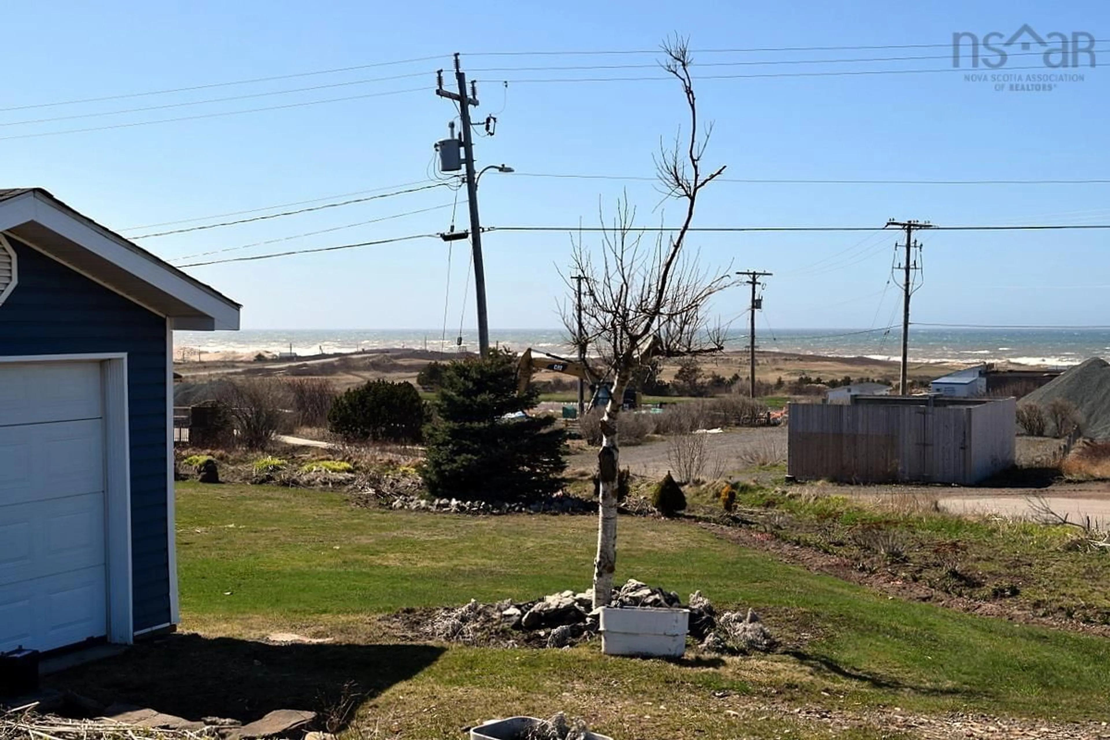 A pic from outside/outdoor area/front of a property/back of a property/a pic from drone, water/lake/river/ocean view for 43 Lower Railway St, Inverness Nova Scotia B0E 1N0