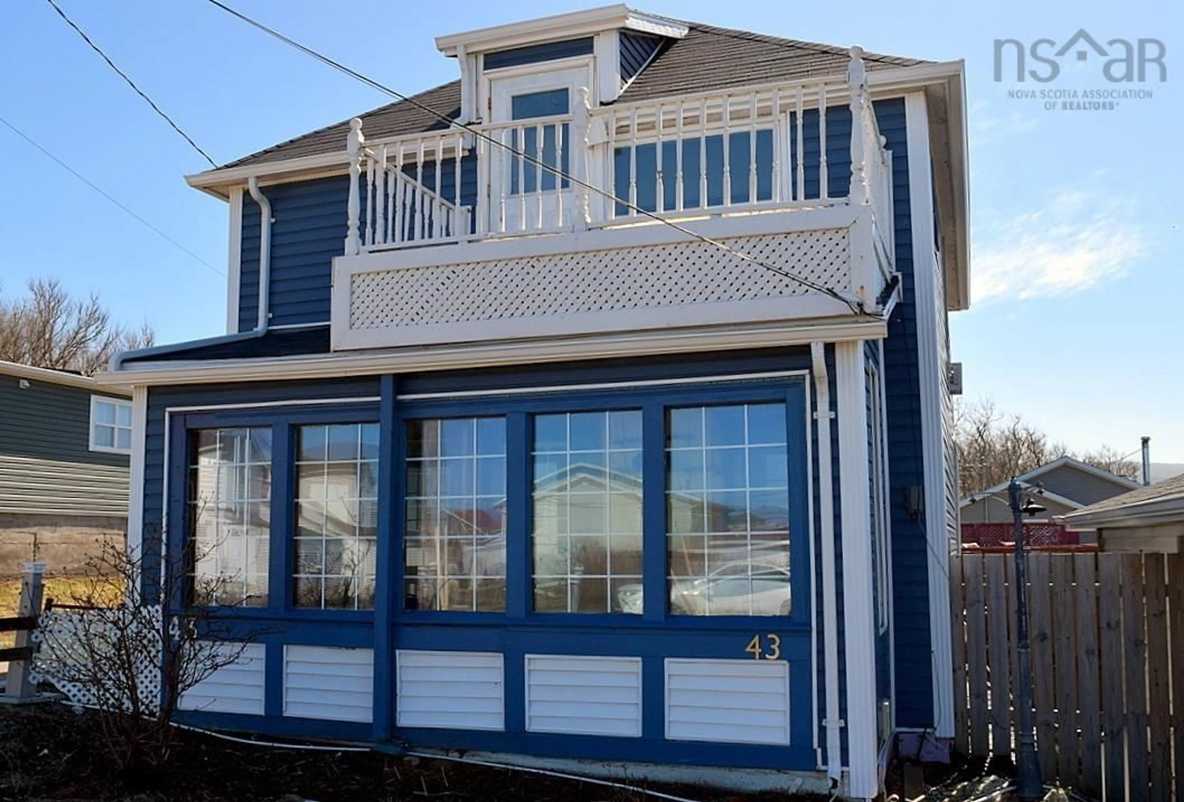 Home with vinyl exterior material, building for 43 Lower Railway St, Inverness Nova Scotia B0E 1N0