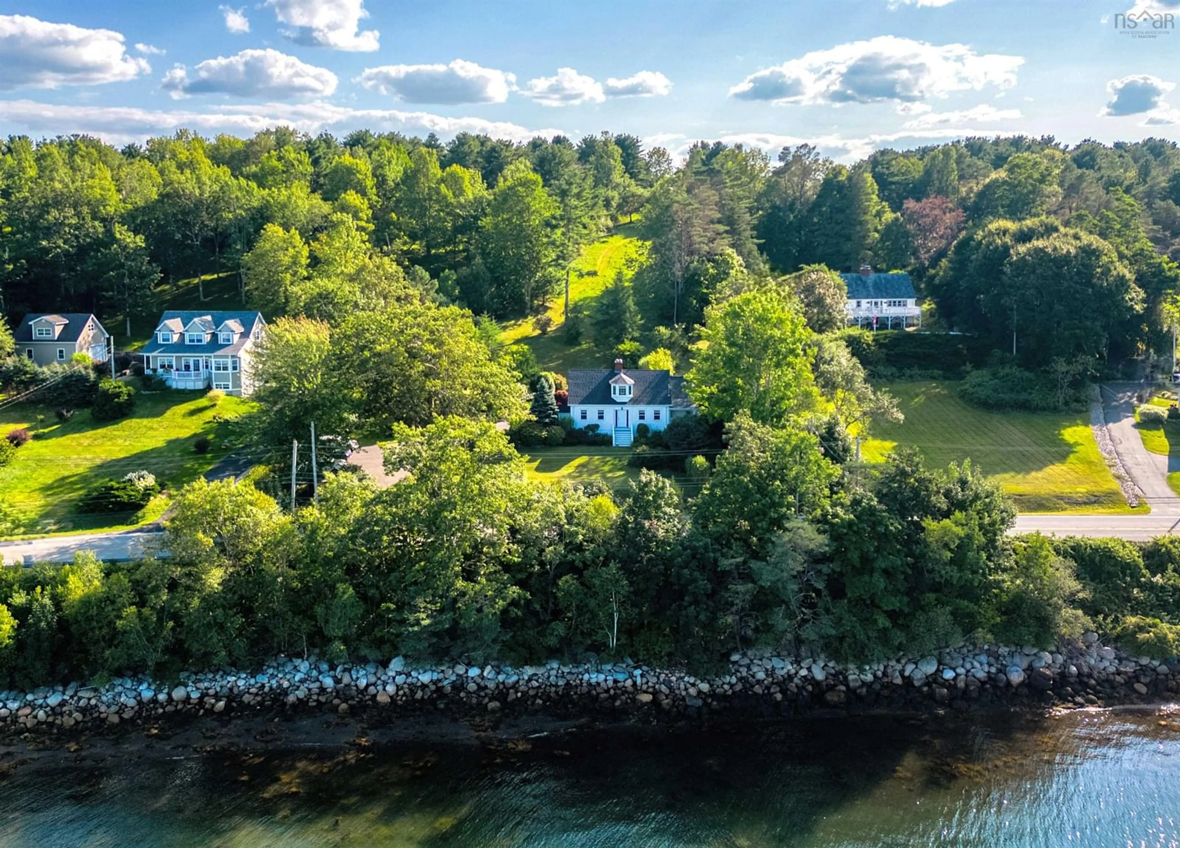 A pic from outside/outdoor area/front of a property/back of a property/a pic from drone, water/lake/river/ocean view for 9178 Highway 3, Maders Cove Nova Scotia B0J 2E0