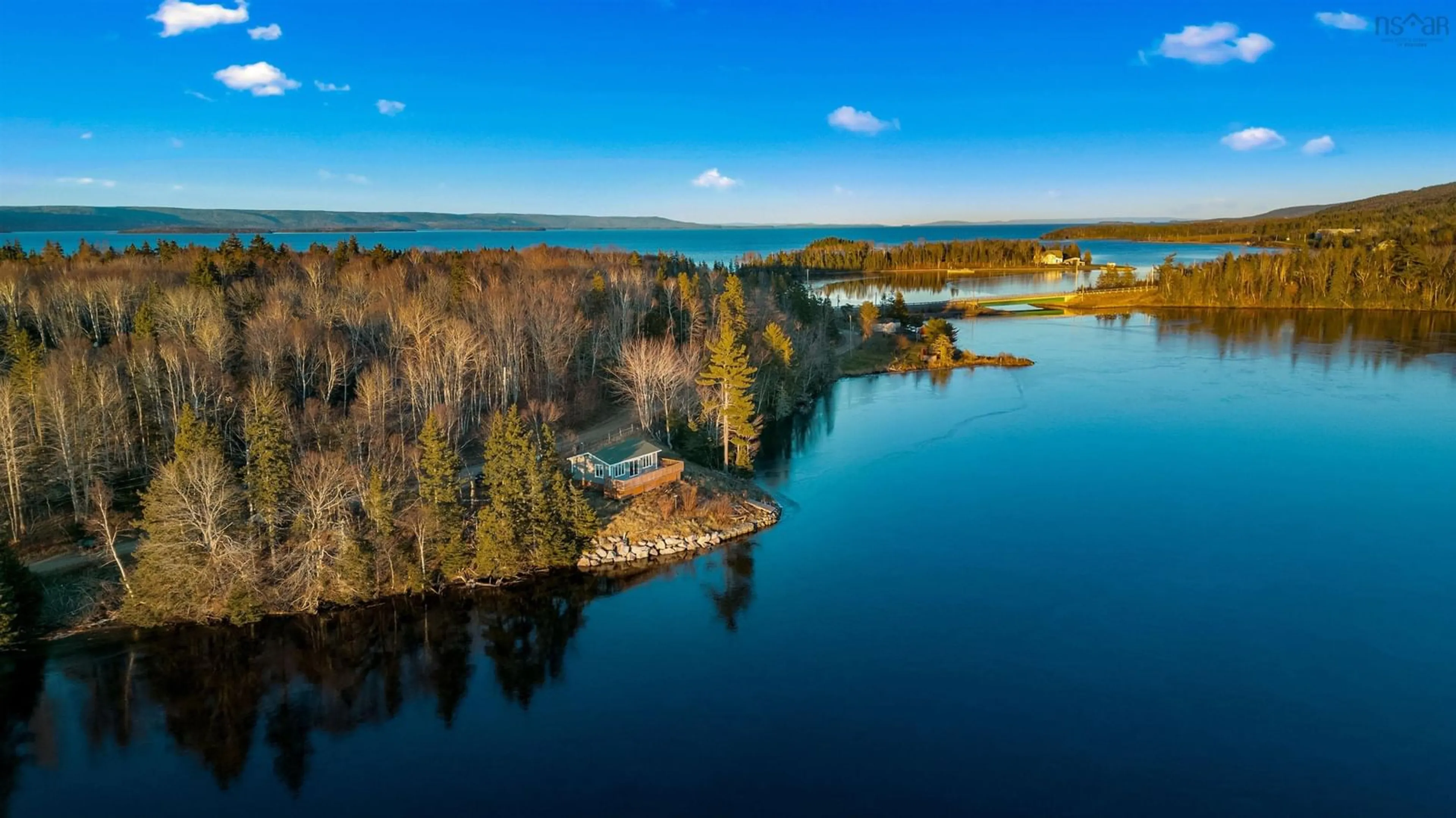 A pic from outside/outdoor area/front of a property/back of a property/a pic from drone, water/lake/river/ocean view for 44 Old Black River Rd, Dundee Nova Scotia B0E 3K0