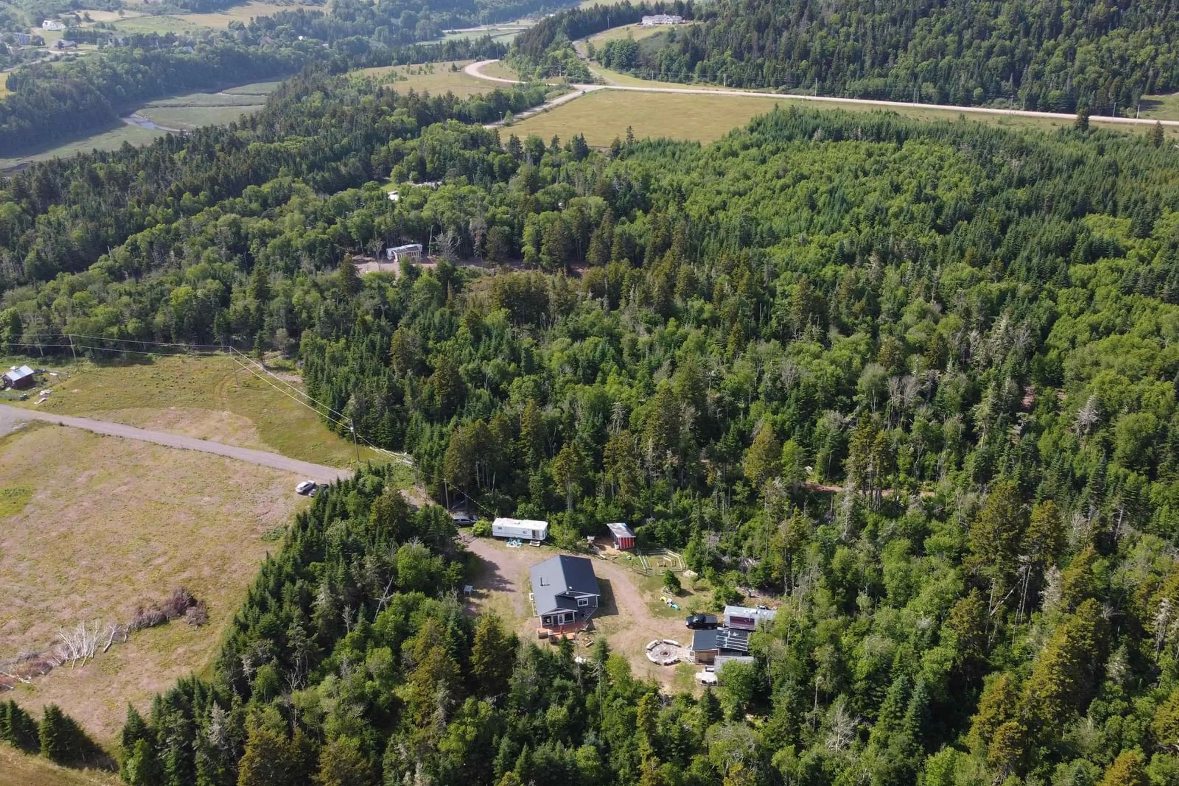 A pic from outside/outdoor area/front of a property/back of a property/a pic from drone, unknown for 498 Fox Point Rd, Fox River Nova Scotia B0M 1S0