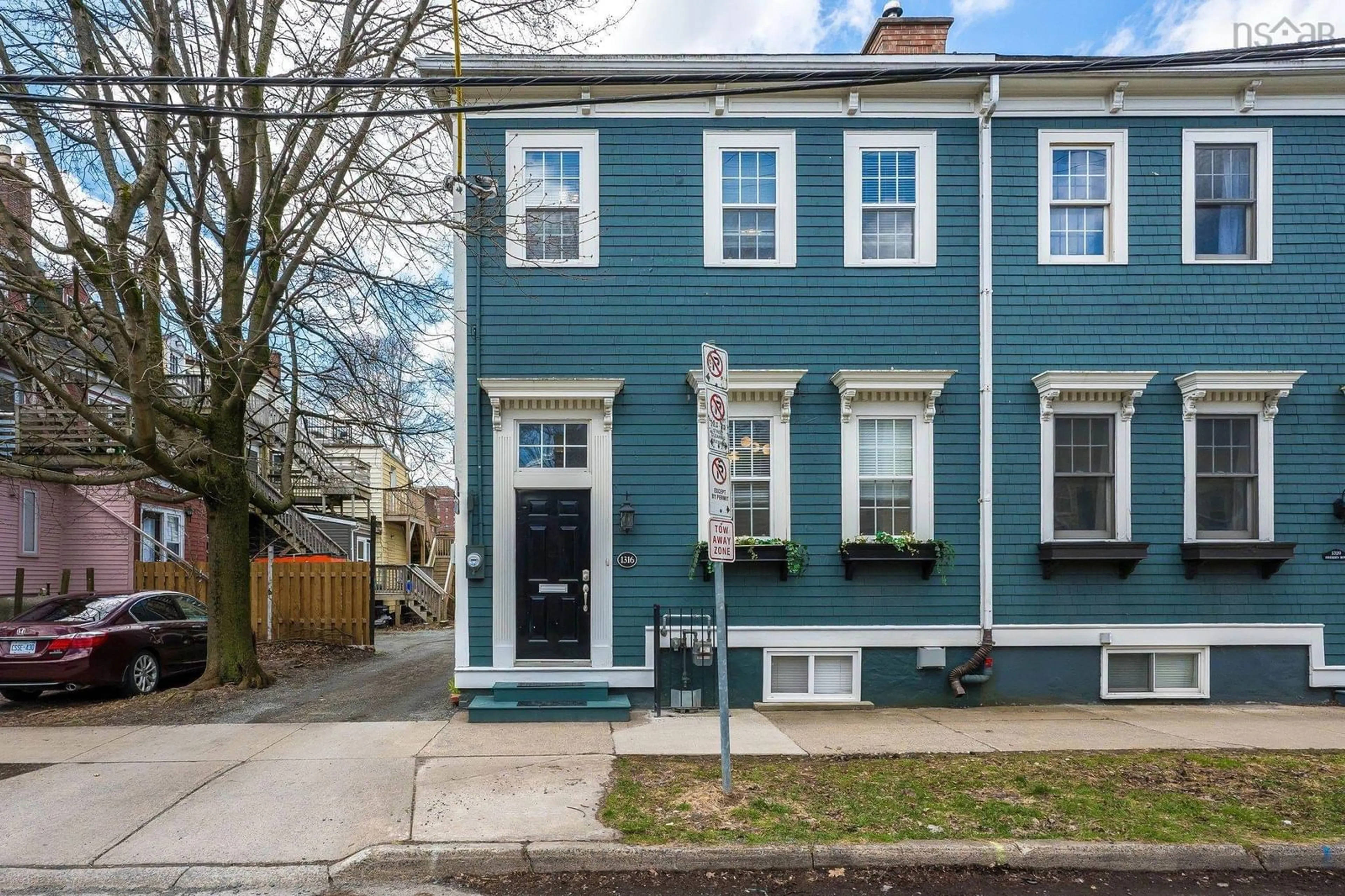Home with vinyl exterior material, street for 1316 Dresden Row, Halifax Nova Scotia B3J 2J8