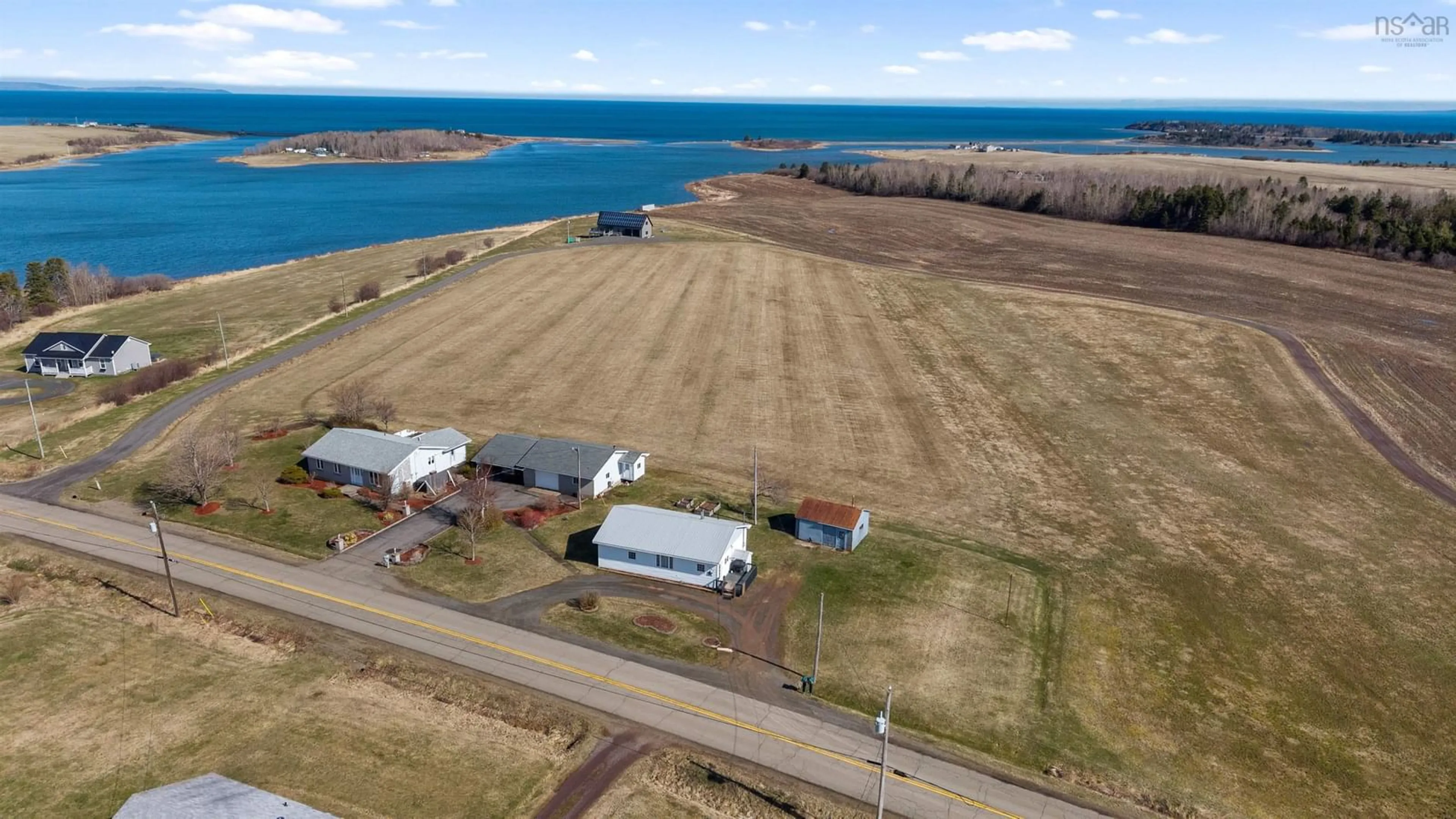 A pic from outside/outdoor area/front of a property/back of a property/a pic from drone, water/lake/river/ocean view for 2569 Summerside Rd, Tracadie Nova Scotia B0H 1A0
