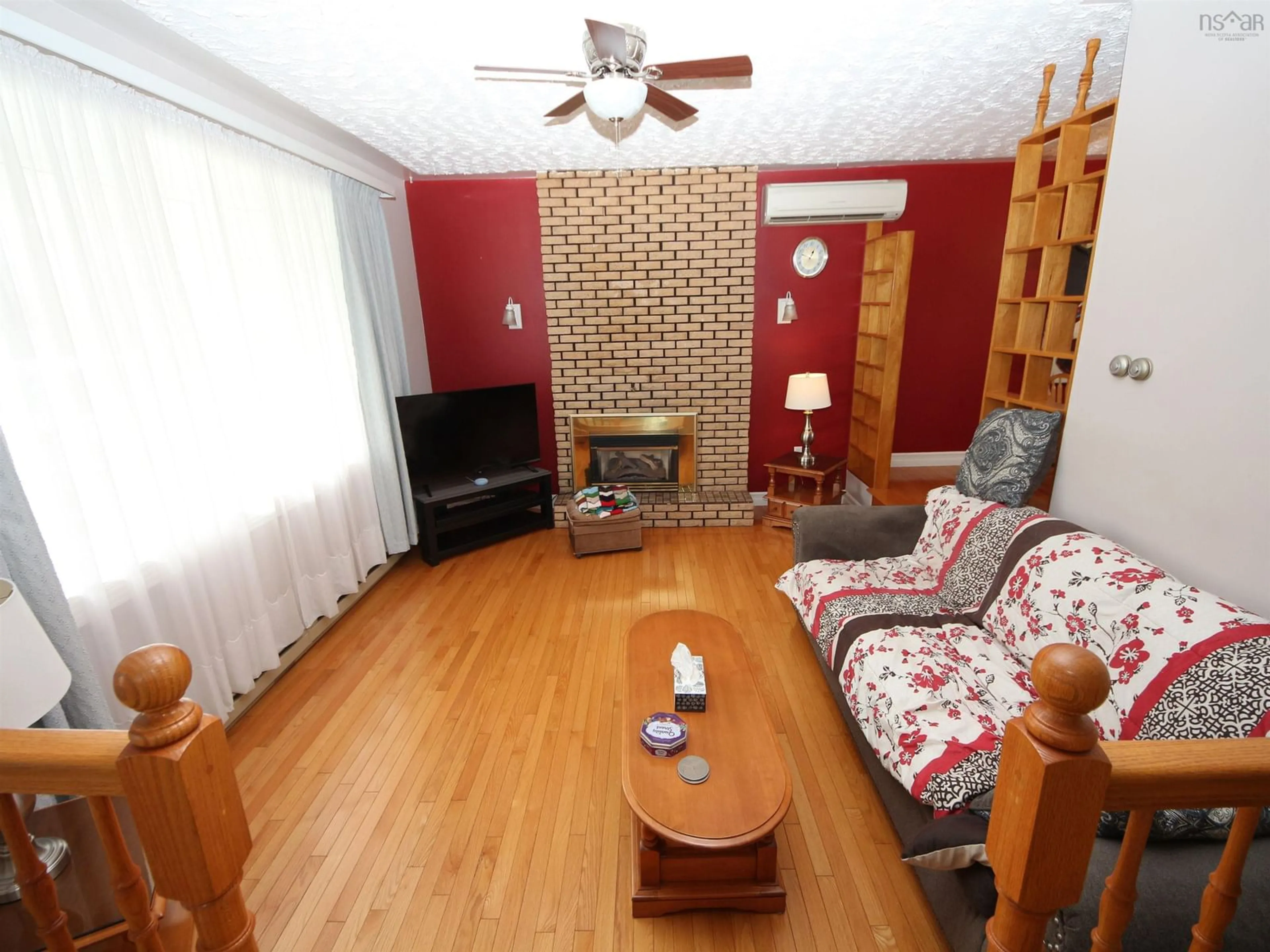 Living room with furniture, wood/laminate floor for 9 Kipling Dr, Lower Sackville Nova Scotia B4C 2X8
