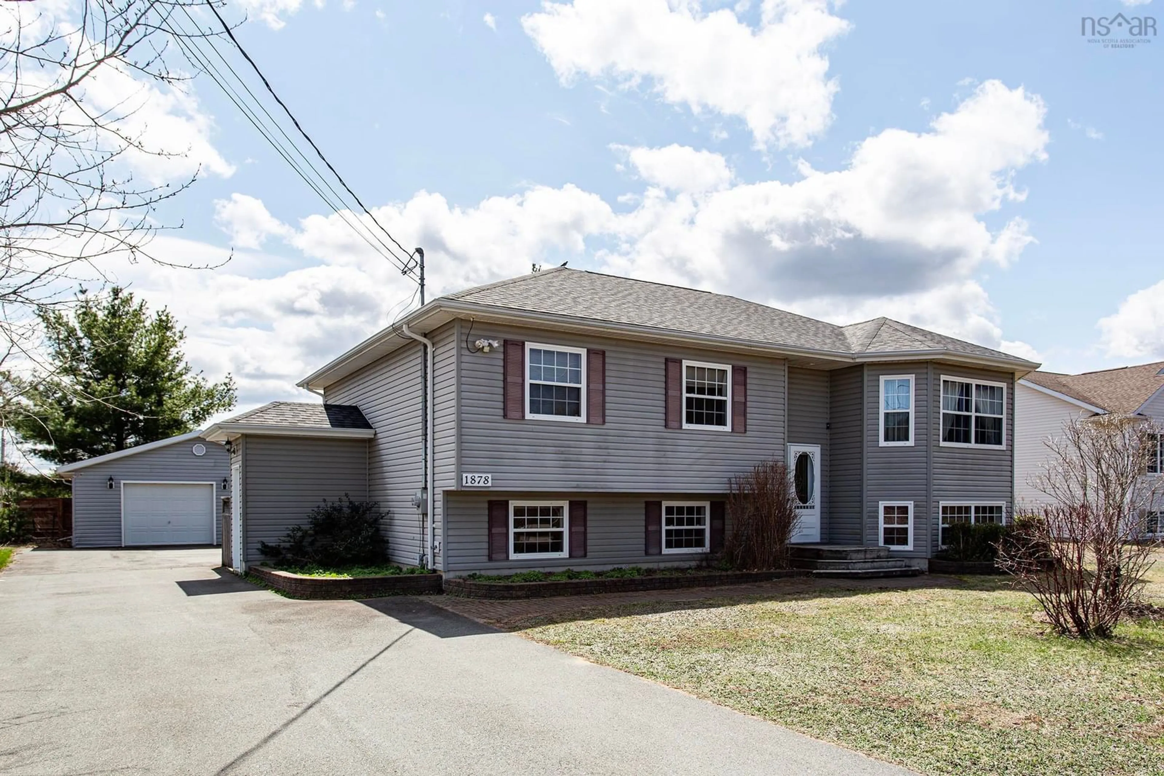 Home with vinyl exterior material, street for 1878 Acadia Dr, Kingston Nova Scotia B0P 1R0