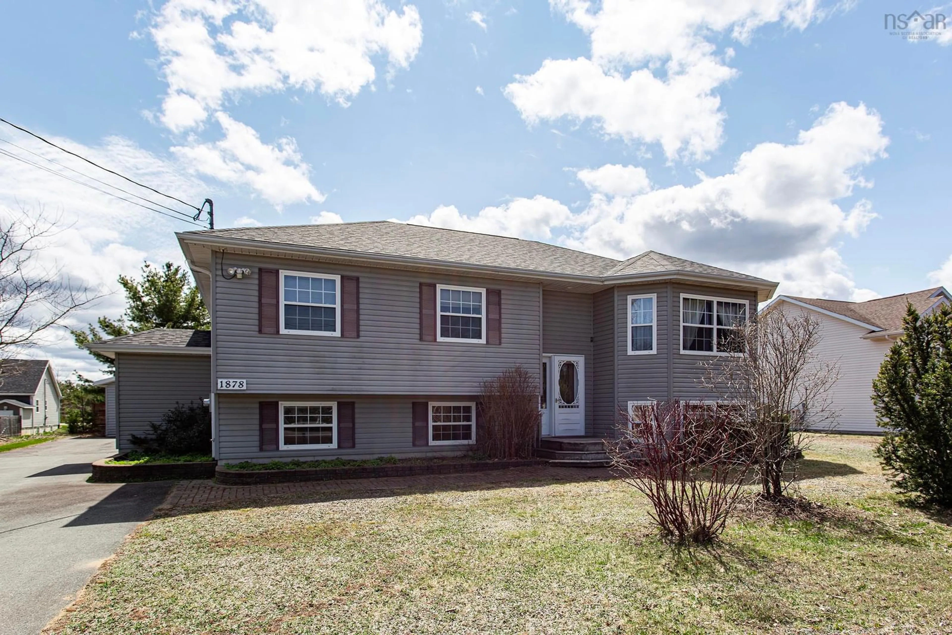 Home with vinyl exterior material, street for 1878 Acadia Dr, Kingston Nova Scotia B0P 1R0