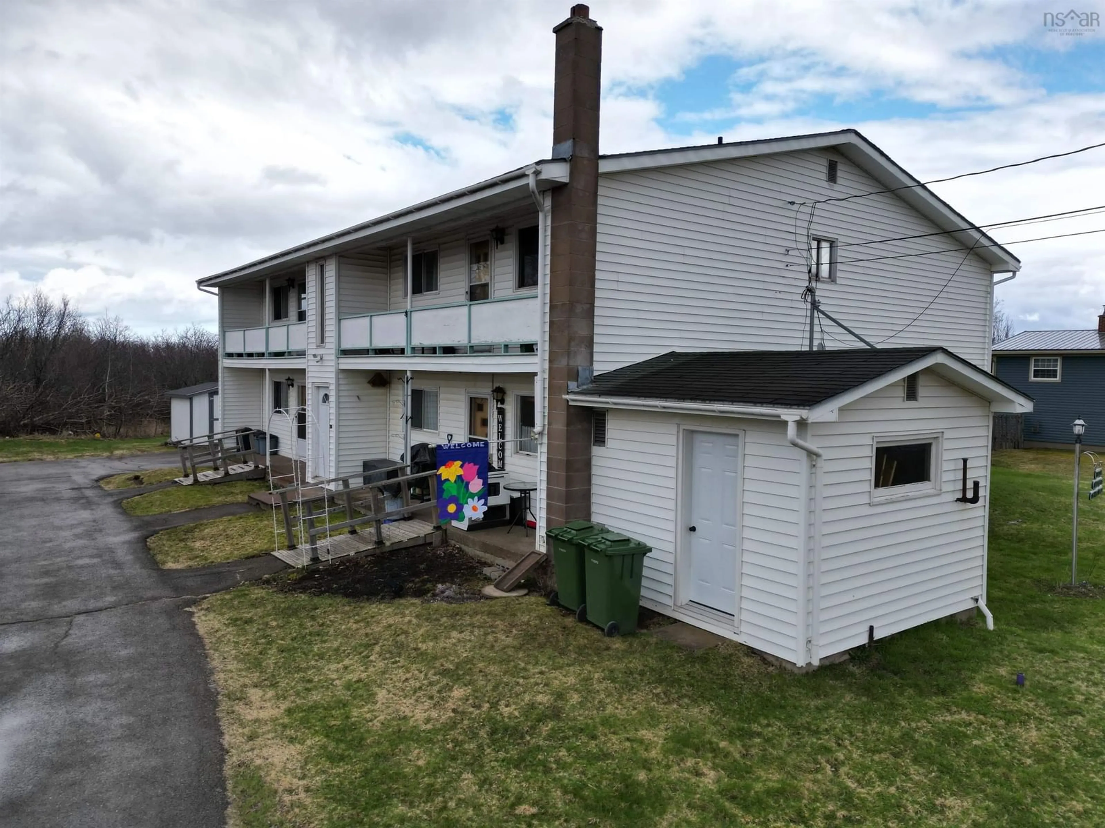 A pic from outside/outdoor area/front of a property/back of a property/a pic from drone, unknown for 106 Pine St, Pictou Nova Scotia B0K 1H0