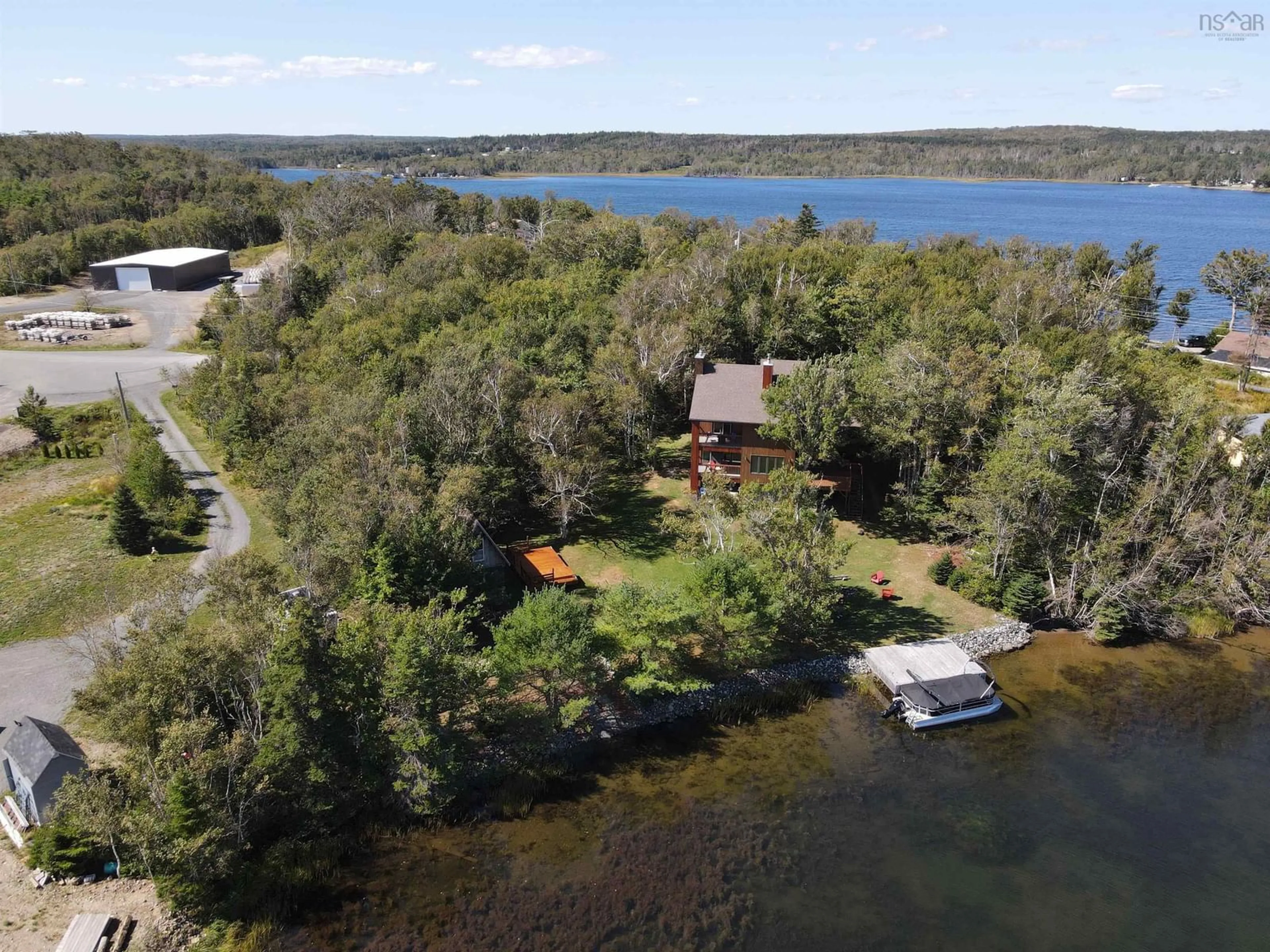 A pic from outside/outdoor area/front of a property/back of a property/a pic from drone, water/lake/river/ocean view for 411 Malcolm's Rd, Albert Bridge Nova Scotia B1K 2T9