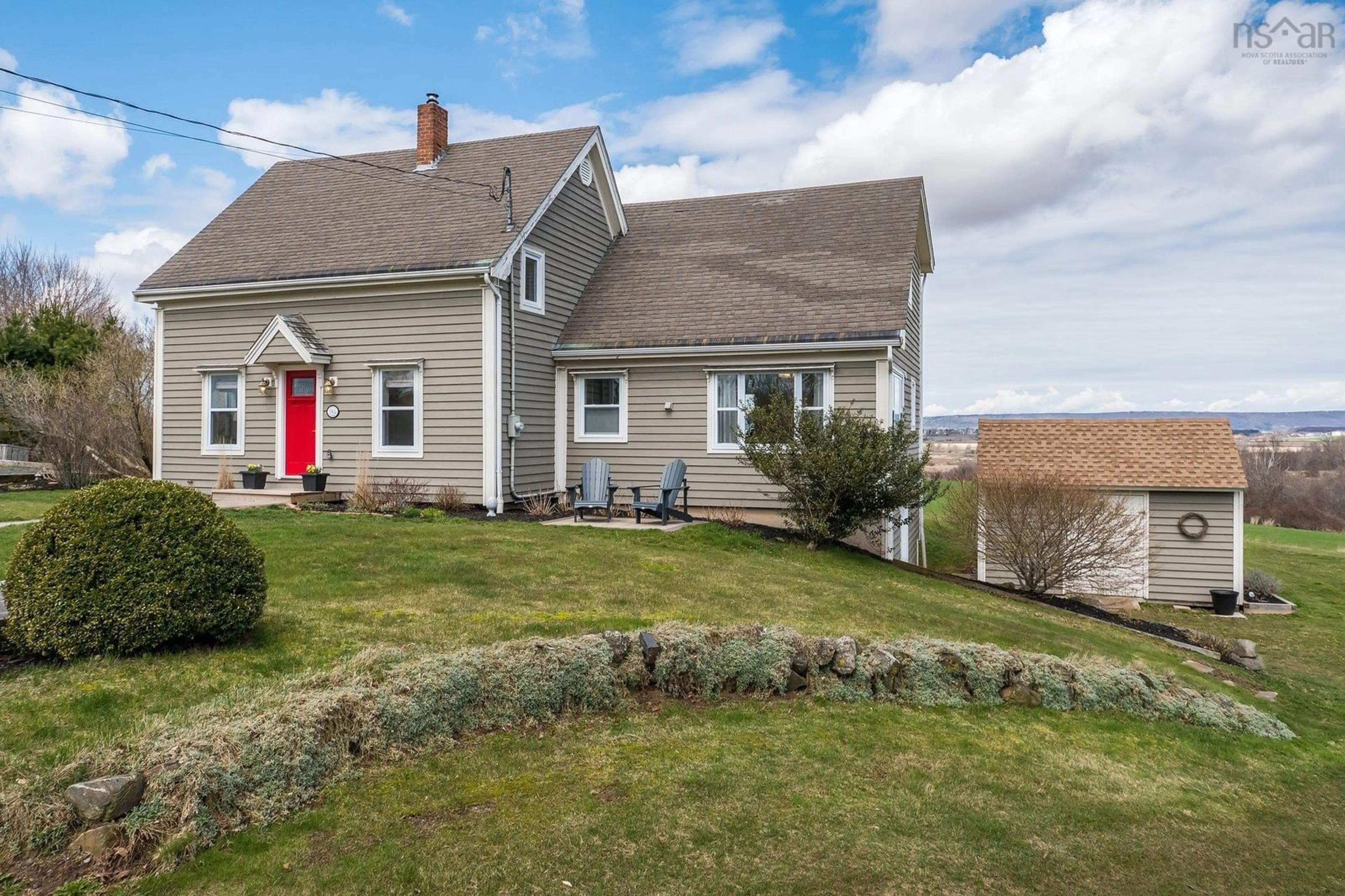 A pic from outside/outdoor area/front of a property/back of a property/a pic from drone, water/lake/river/ocean view for 765 Church St, Port Williams Nova Scotia B0P 1T0
