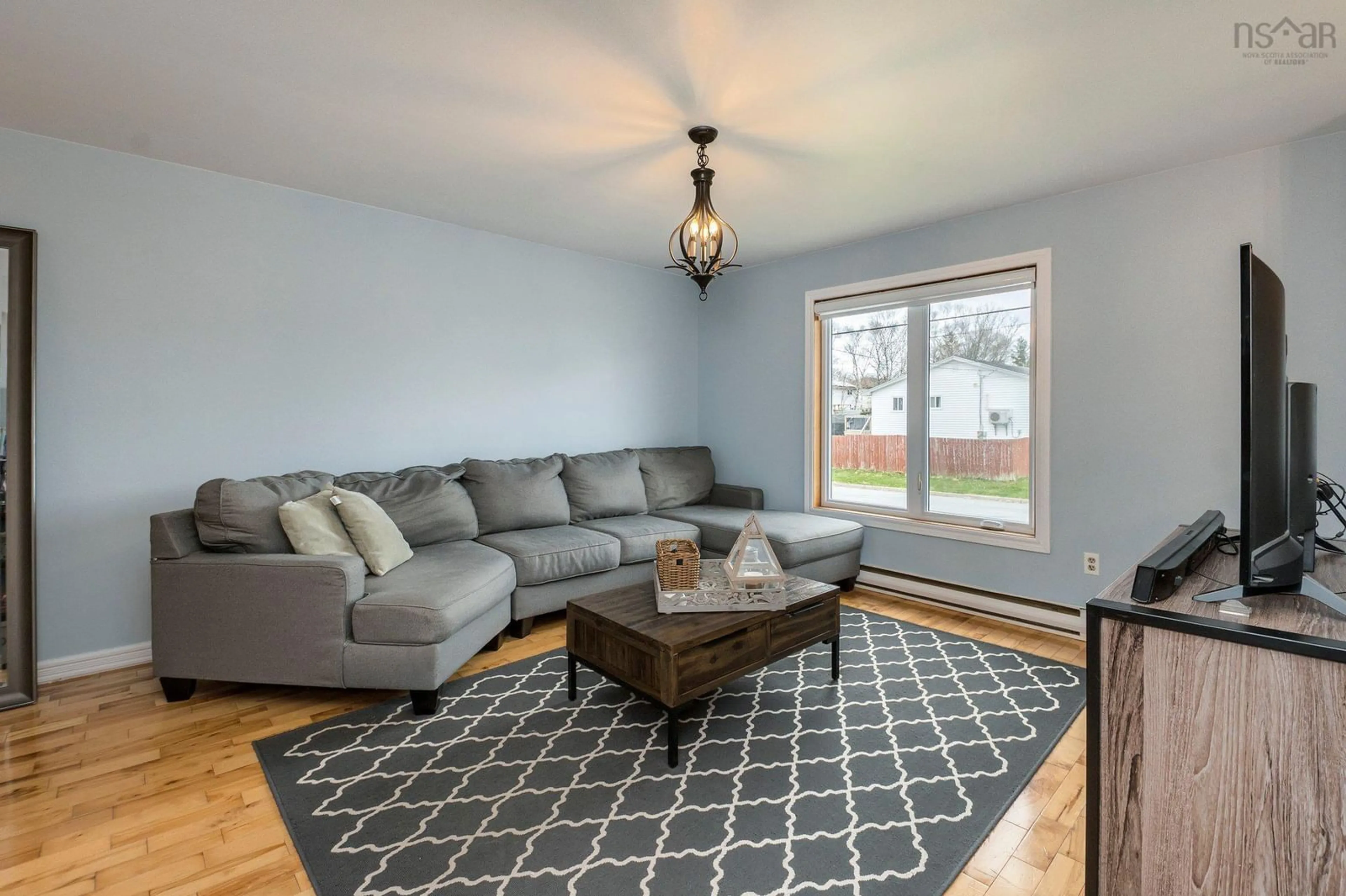 Living room with furniture, wood/laminate floor for 37 Norway Maple Dr, Timberlea Nova Scotia B3T 1H7