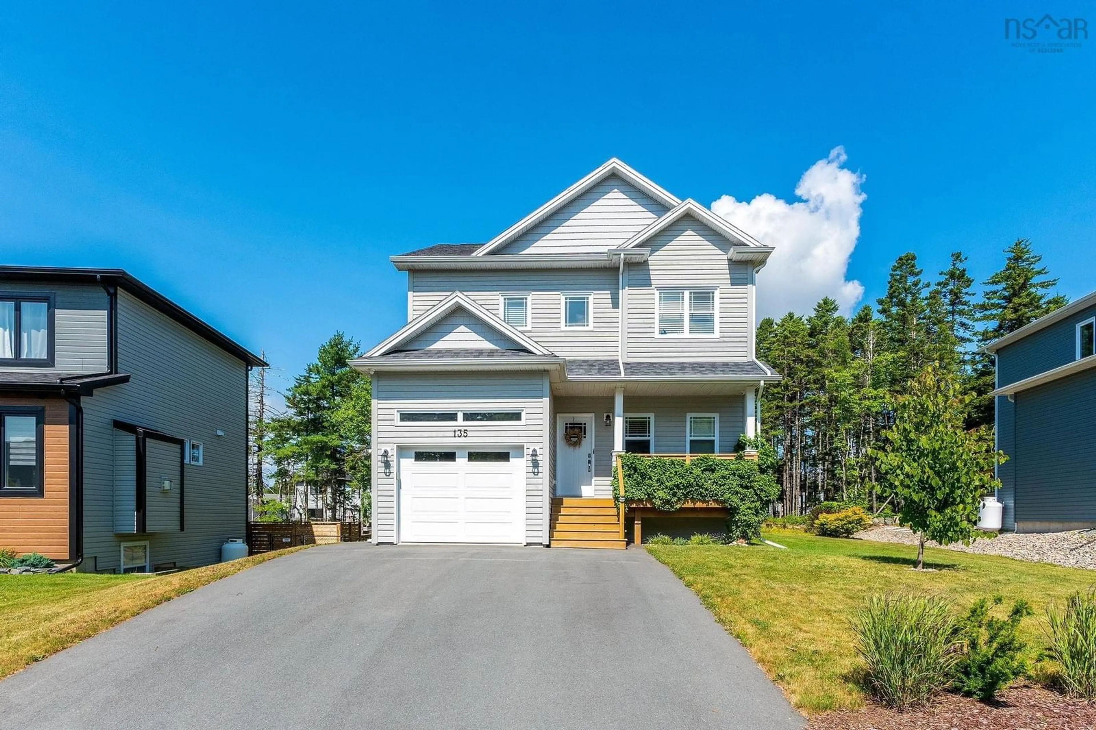 Home with vinyl exterior material, street for 135 Lewis Dr, Bedford Nova Scotia B4B 0L3