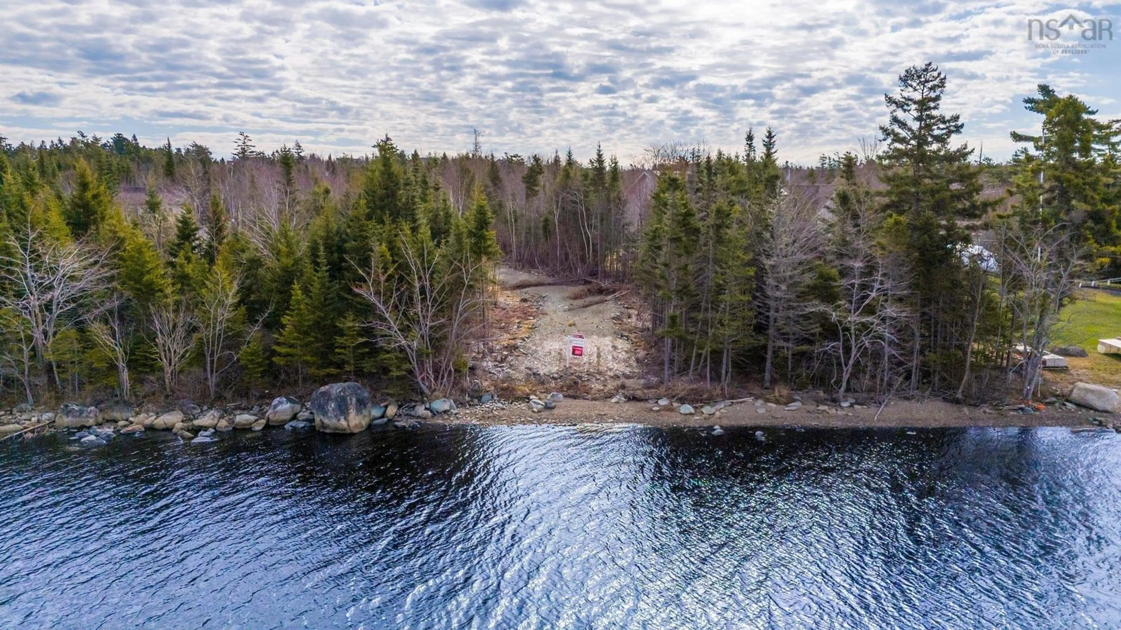 A pic from outside/outdoor area/front of a property/back of a property/a pic from drone, water/lake/river/ocean view for 32 Mannette Crt, Porters Lake Nova Scotia B3E 1M9