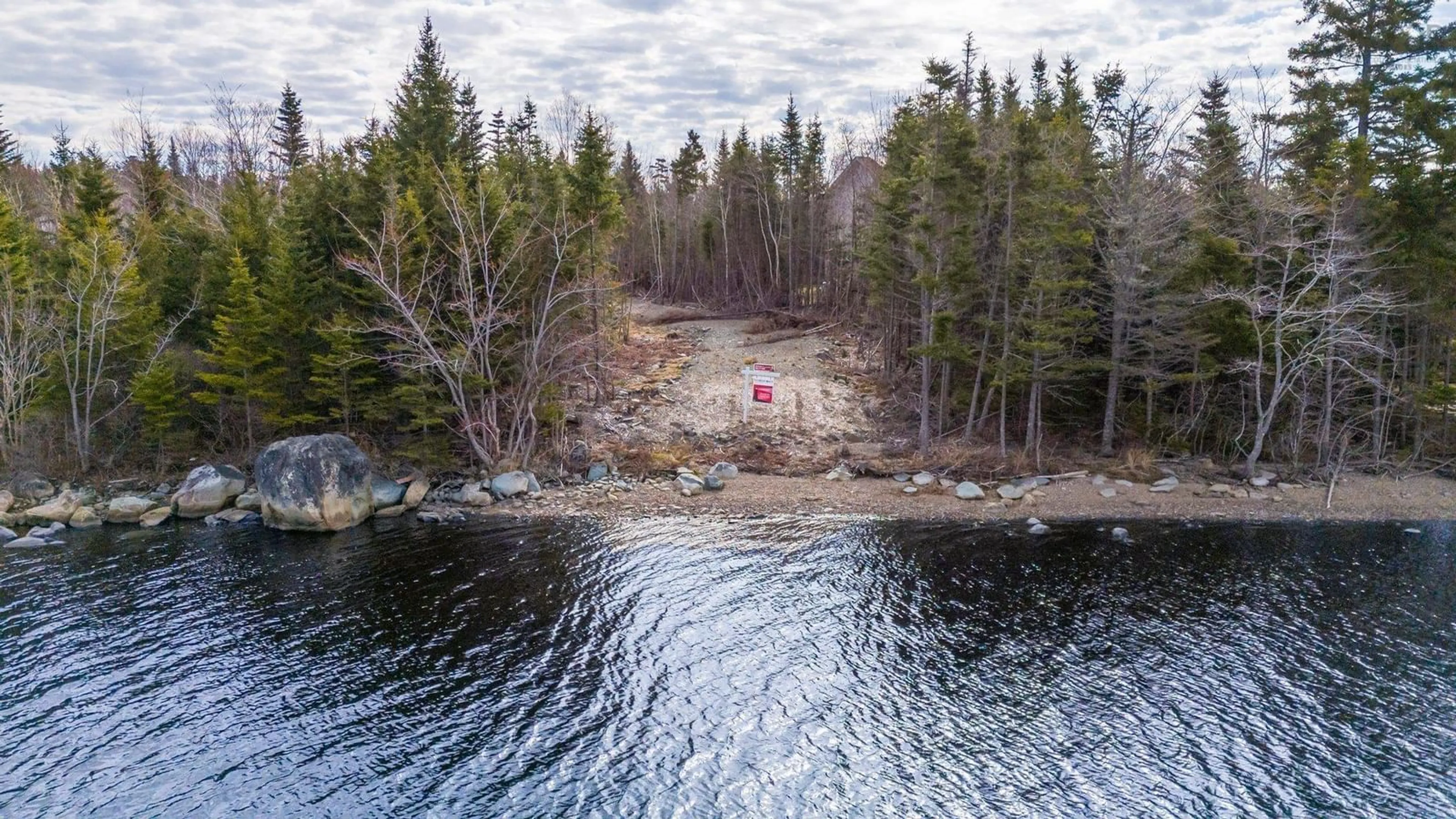 A pic from outside/outdoor area/front of a property/back of a property/a pic from drone, water/lake/river/ocean view for 32 Mannette Crt, Porters Lake Nova Scotia B3E 1M9