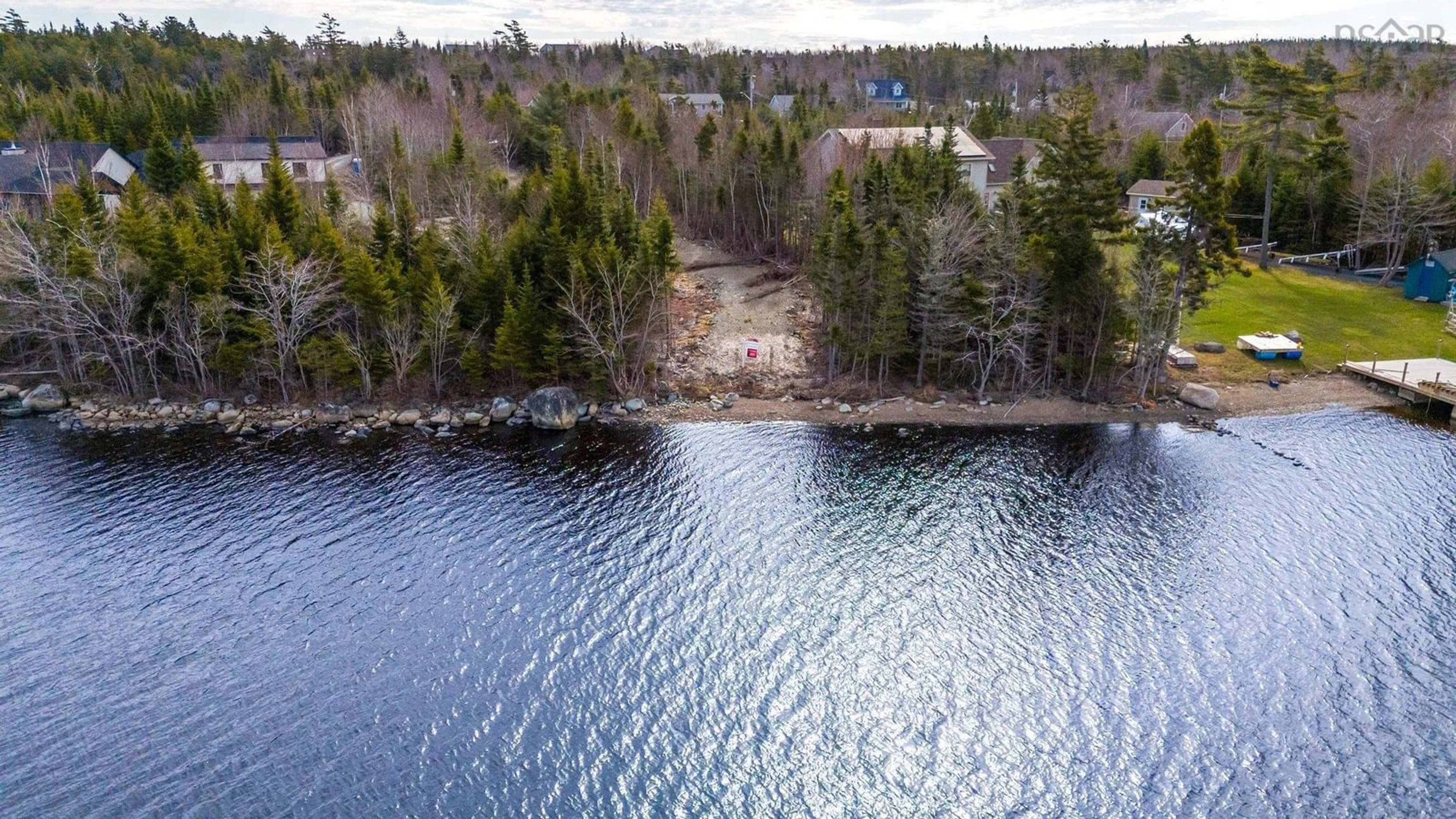 A pic from outside/outdoor area/front of a property/back of a property/a pic from drone, water/lake/river/ocean view for 32 Mannette Crt, Porters Lake Nova Scotia B3E 1M9