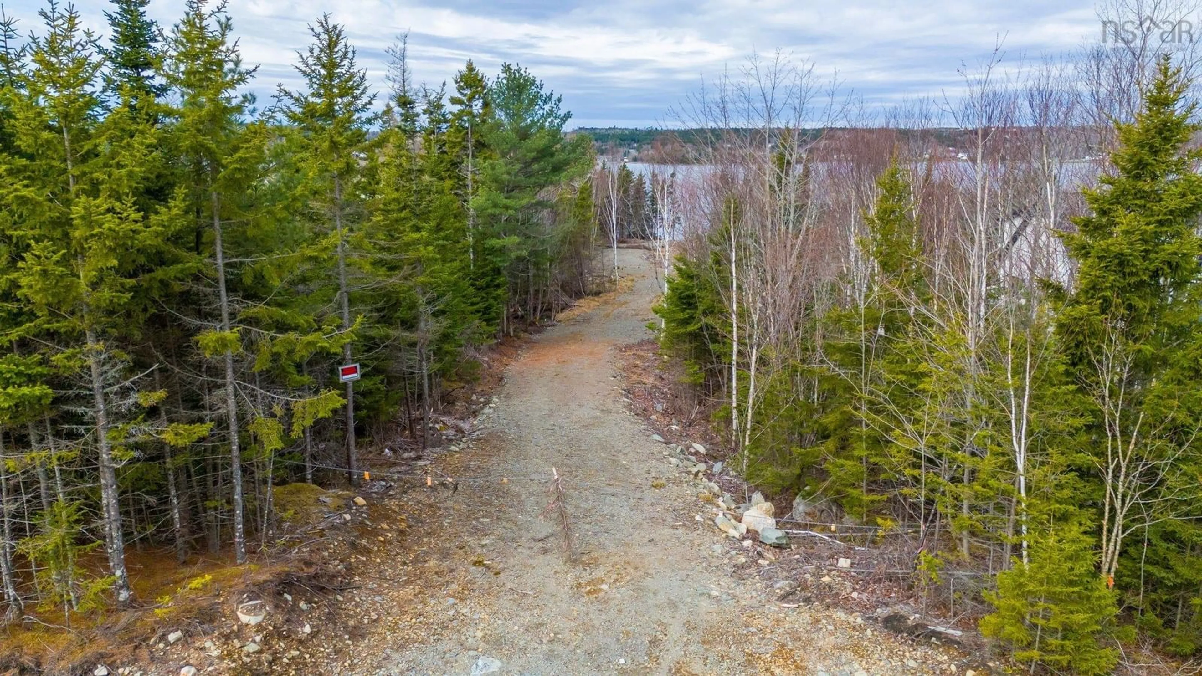 A pic from outside/outdoor area/front of a property/back of a property/a pic from drone, forest/trees view for 32 Mannette Crt, Porters Lake Nova Scotia B3E 1M9