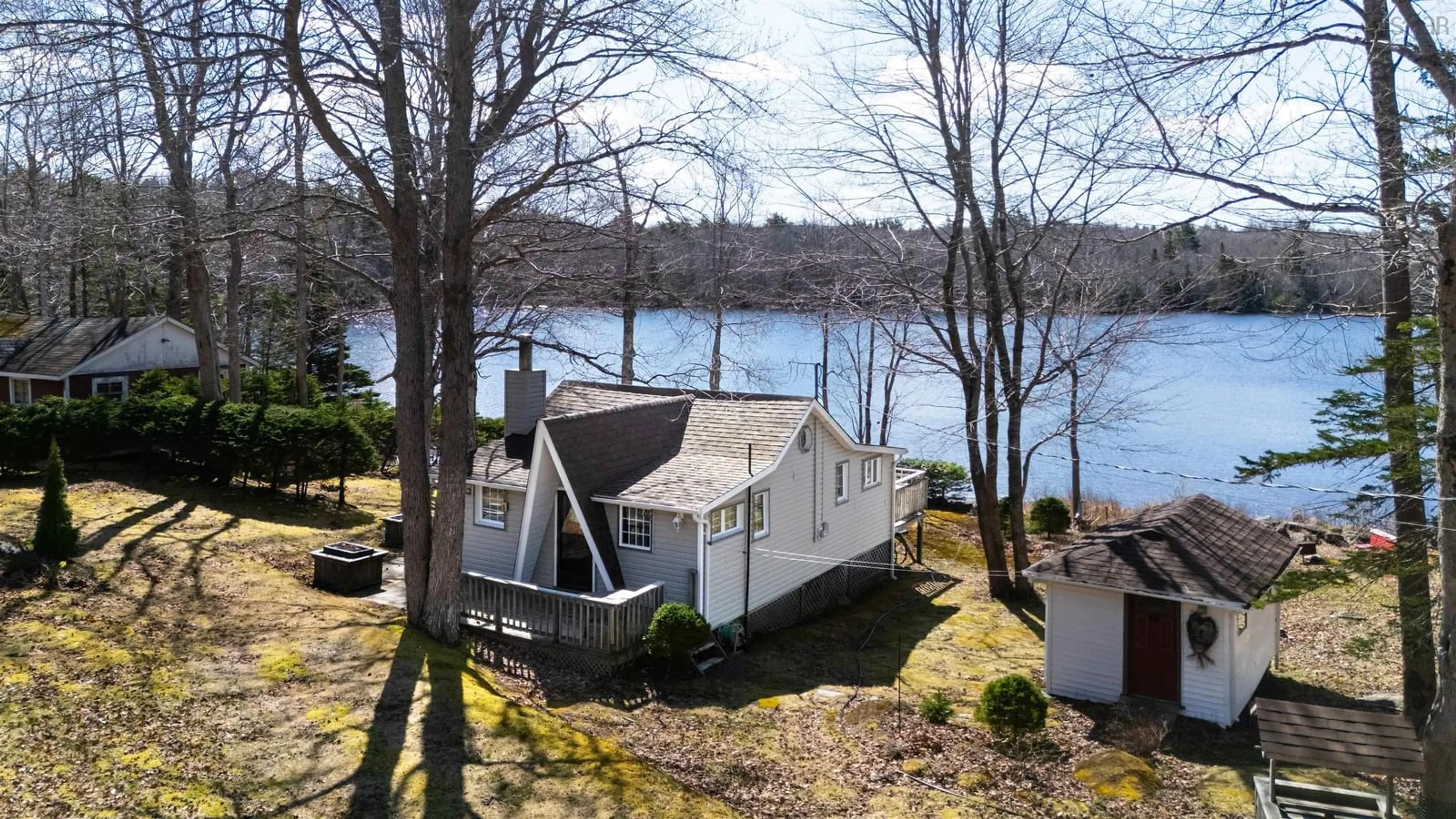 A pic from outside/outdoor area/front of a property/back of a property/a pic from drone, water/lake/river/ocean view for 23 Lake Cady Rd, Virginia East Nova Scotia B0S 1G0