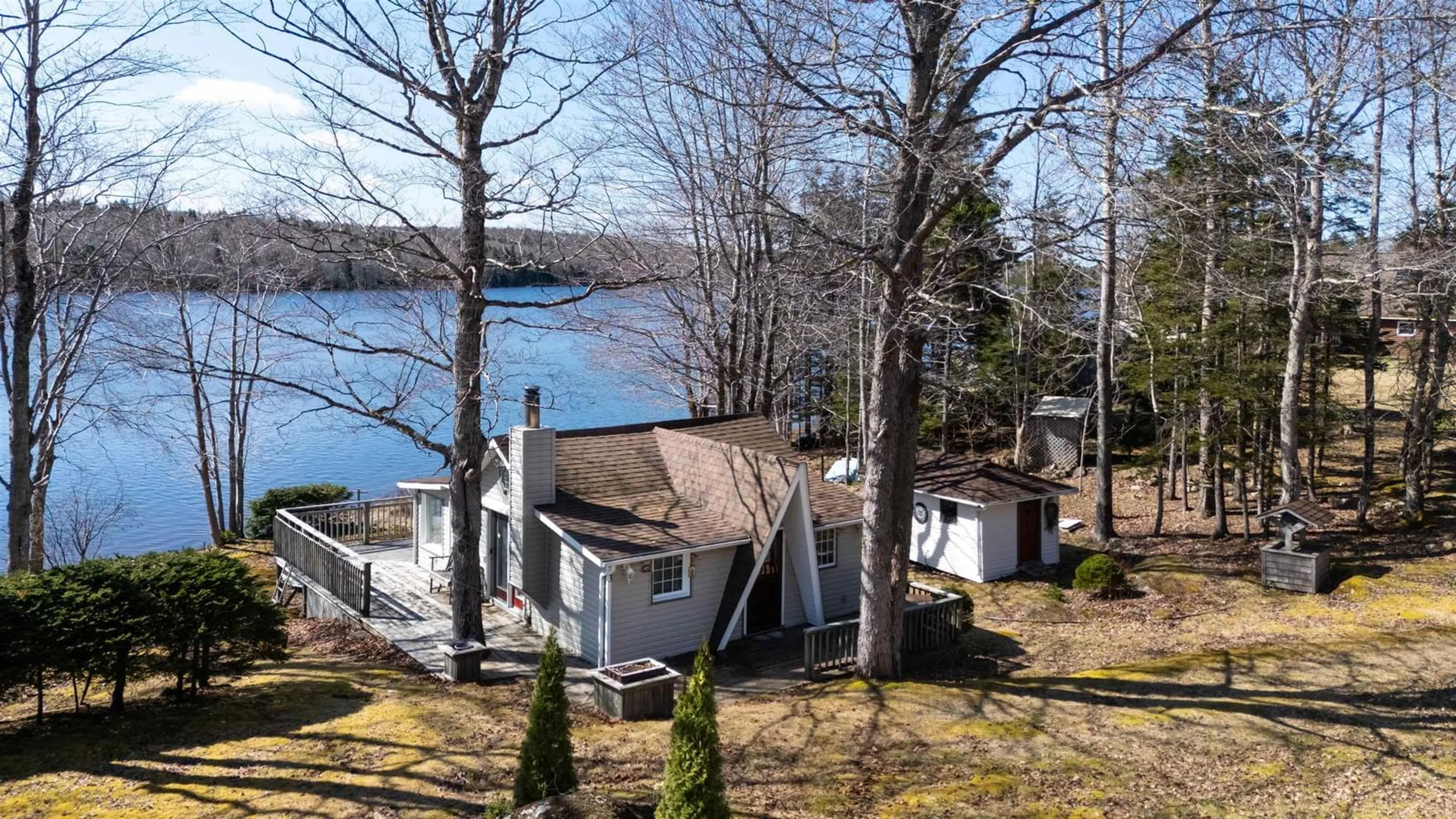 A pic from outside/outdoor area/front of a property/back of a property/a pic from drone, water/lake/river/ocean view for 23 Lake Cady Rd, Virginia East Nova Scotia B0S 1G0