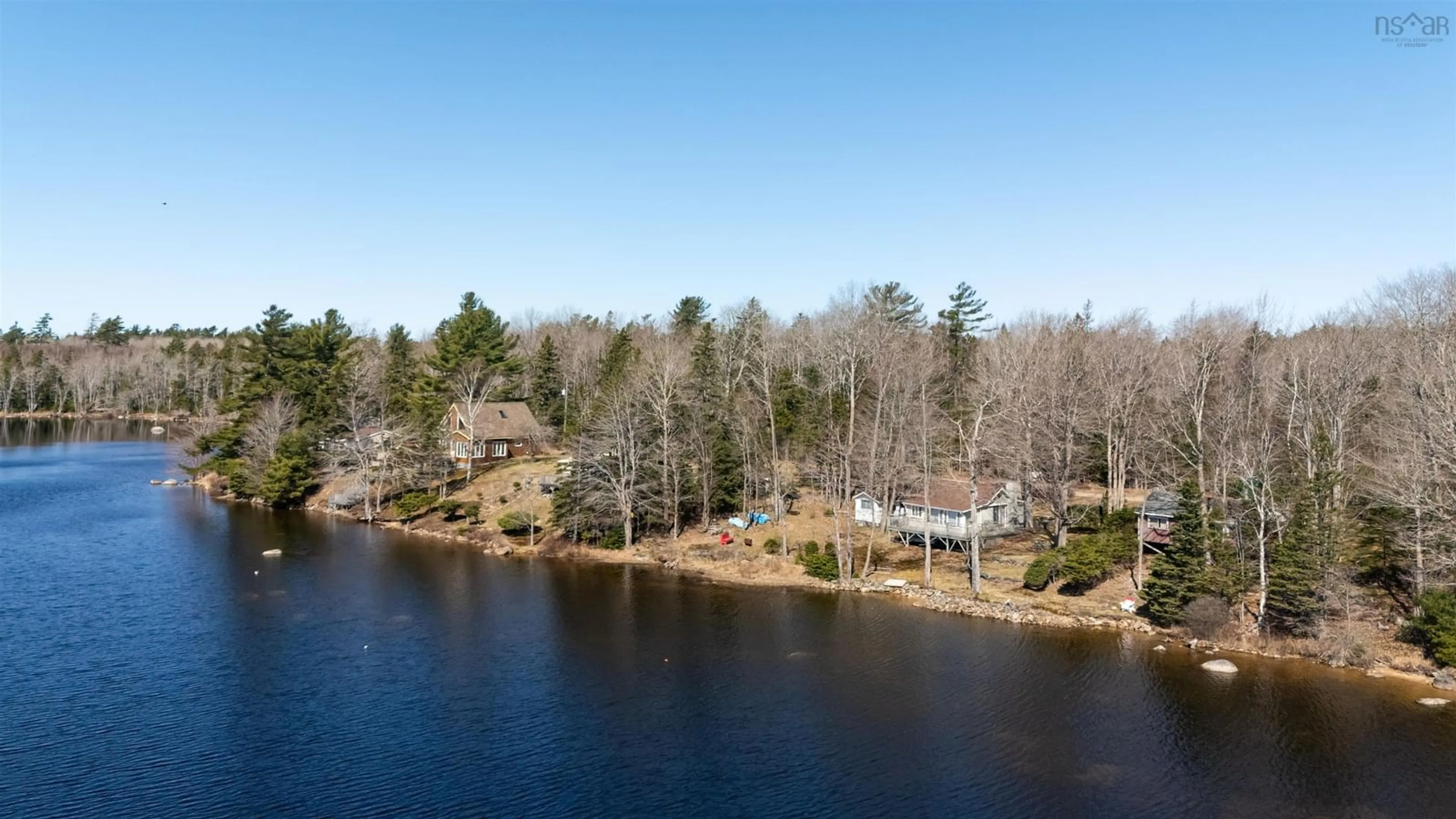 A pic from outside/outdoor area/front of a property/back of a property/a pic from drone, water/lake/river/ocean view for 23 Lake Cady Rd, Virginia East Nova Scotia B0S 1G0
