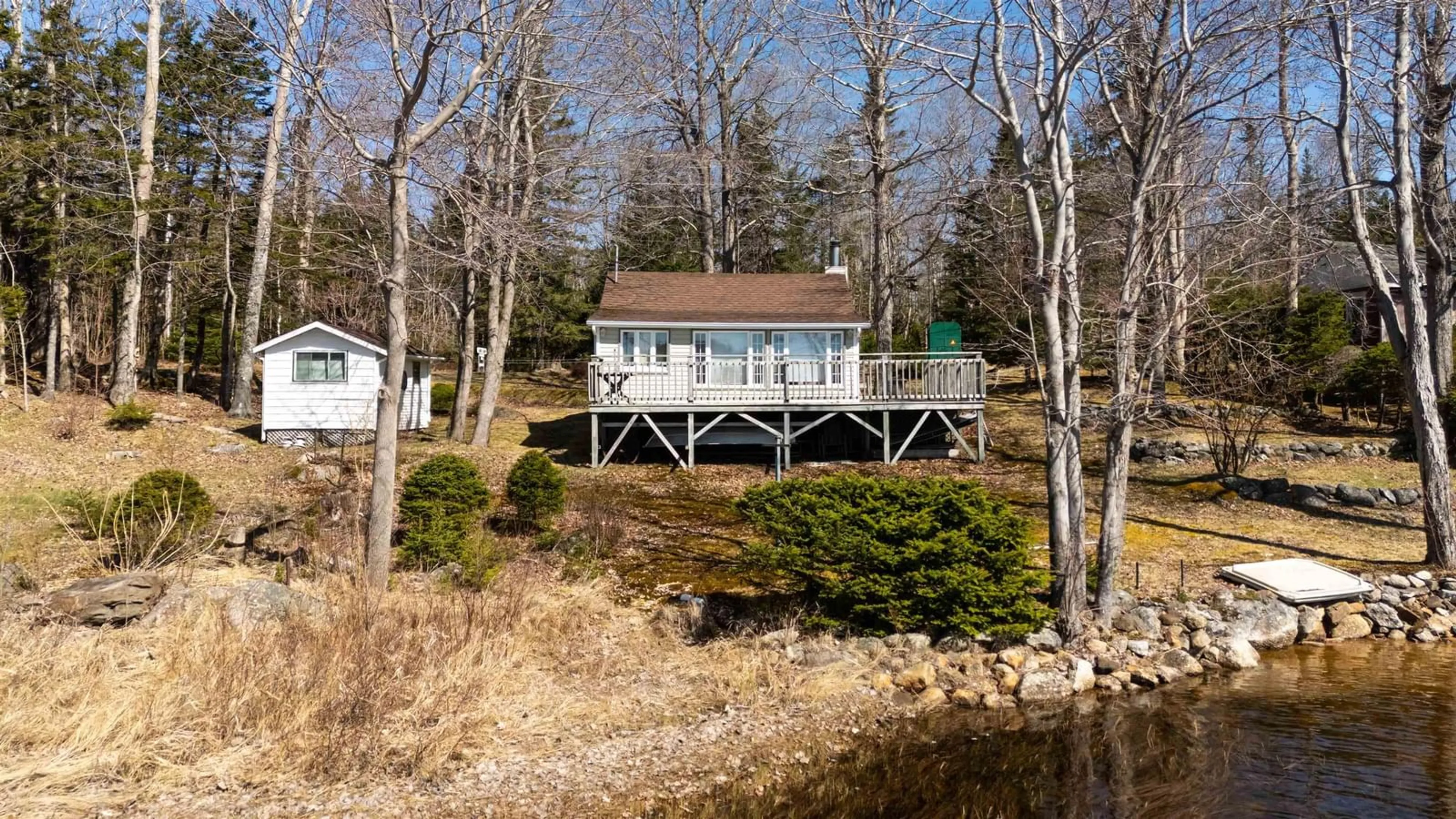 A pic from outside/outdoor area/front of a property/back of a property/a pic from drone, water/lake/river/ocean view for 23 Lake Cady Rd, Virginia East Nova Scotia B0S 1G0