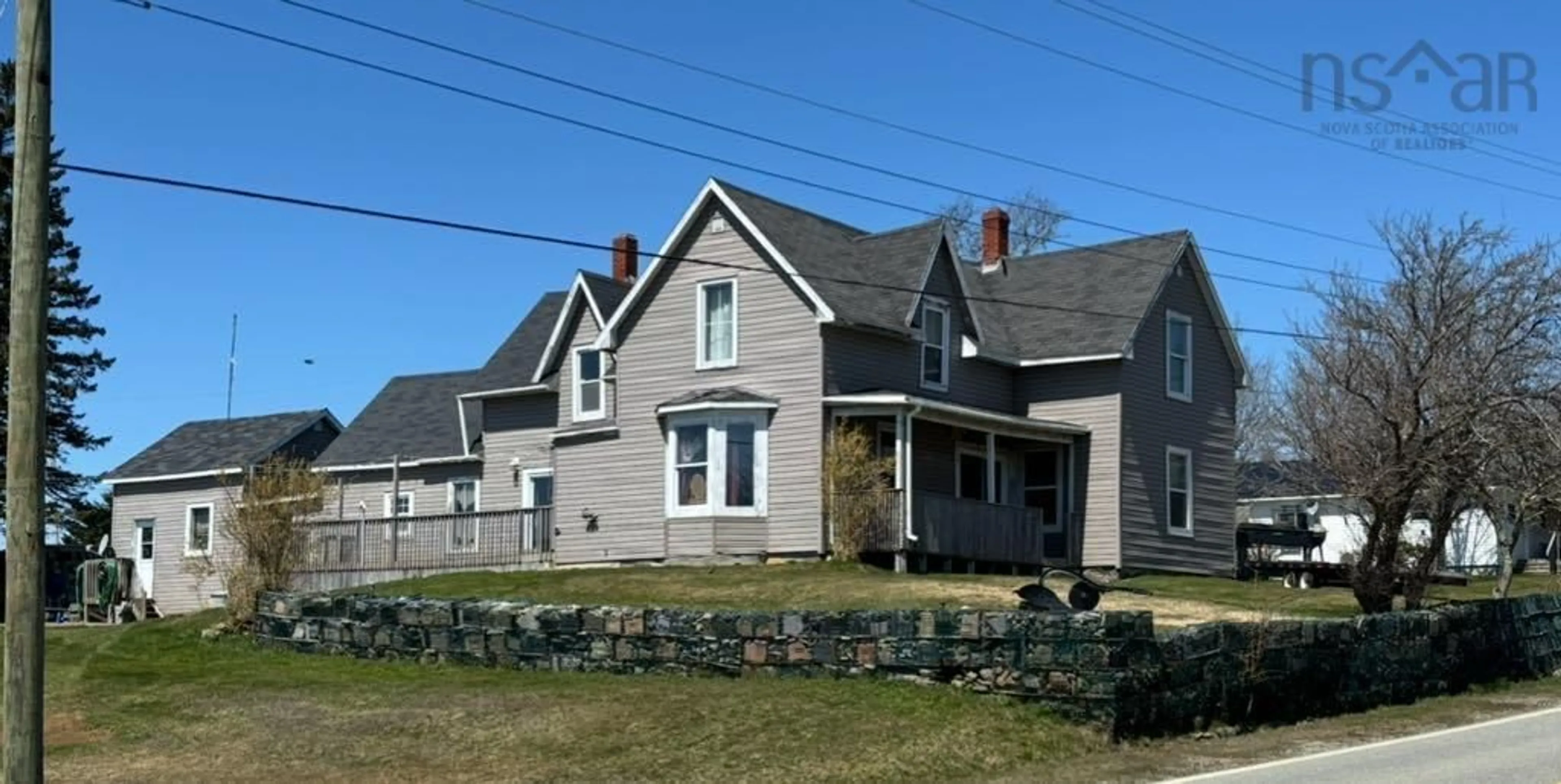 Home with vinyl exterior material, street for 5 Strickland Rd, Wellington Nova Scotia B5A 5A6