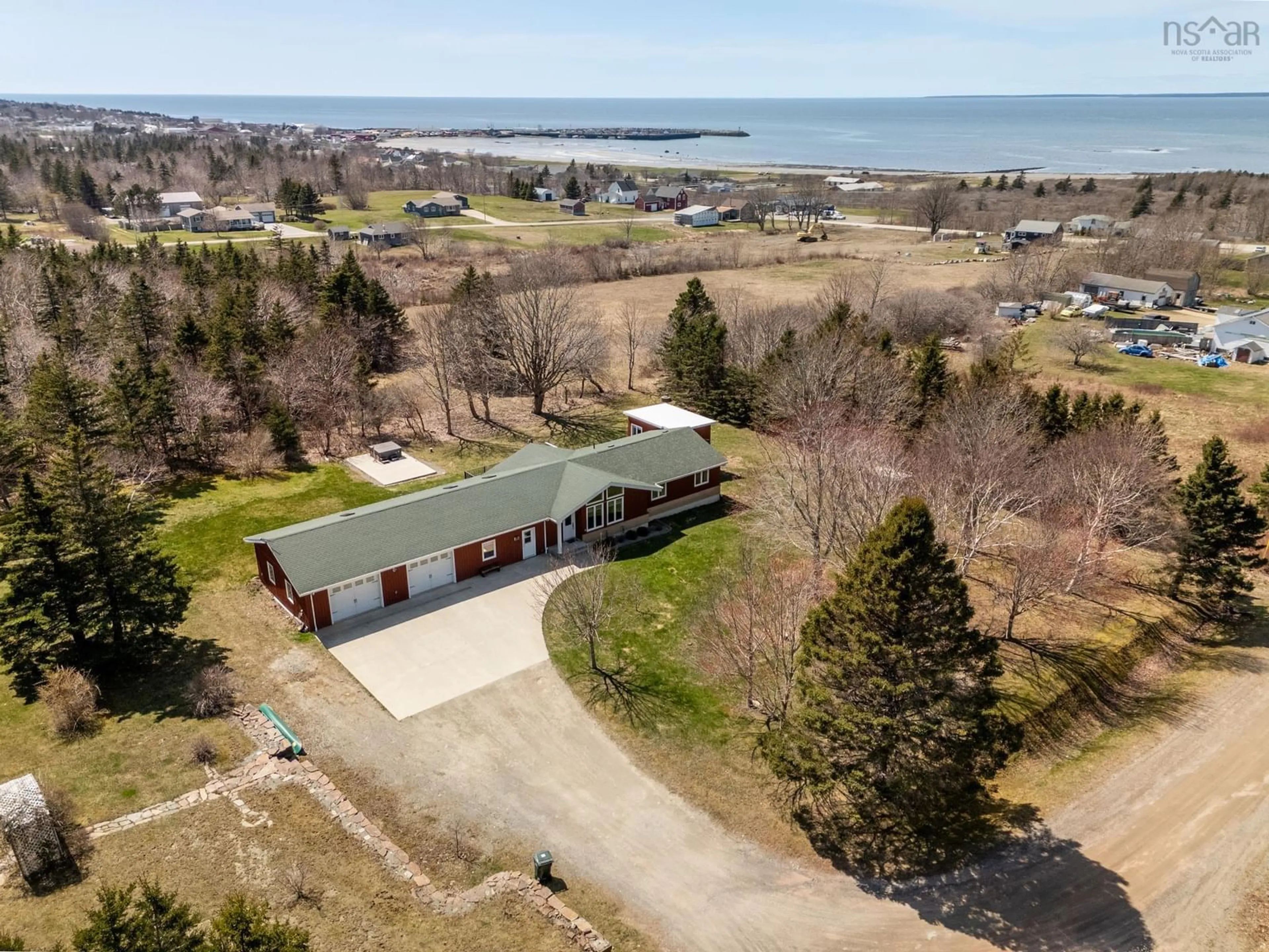 A pic from outside/outdoor area/front of a property/back of a property/a pic from drone, water/lake/river/ocean view for 180 John Thibodeau Rd, Meteghan Centre Nova Scotia B0W 2K0