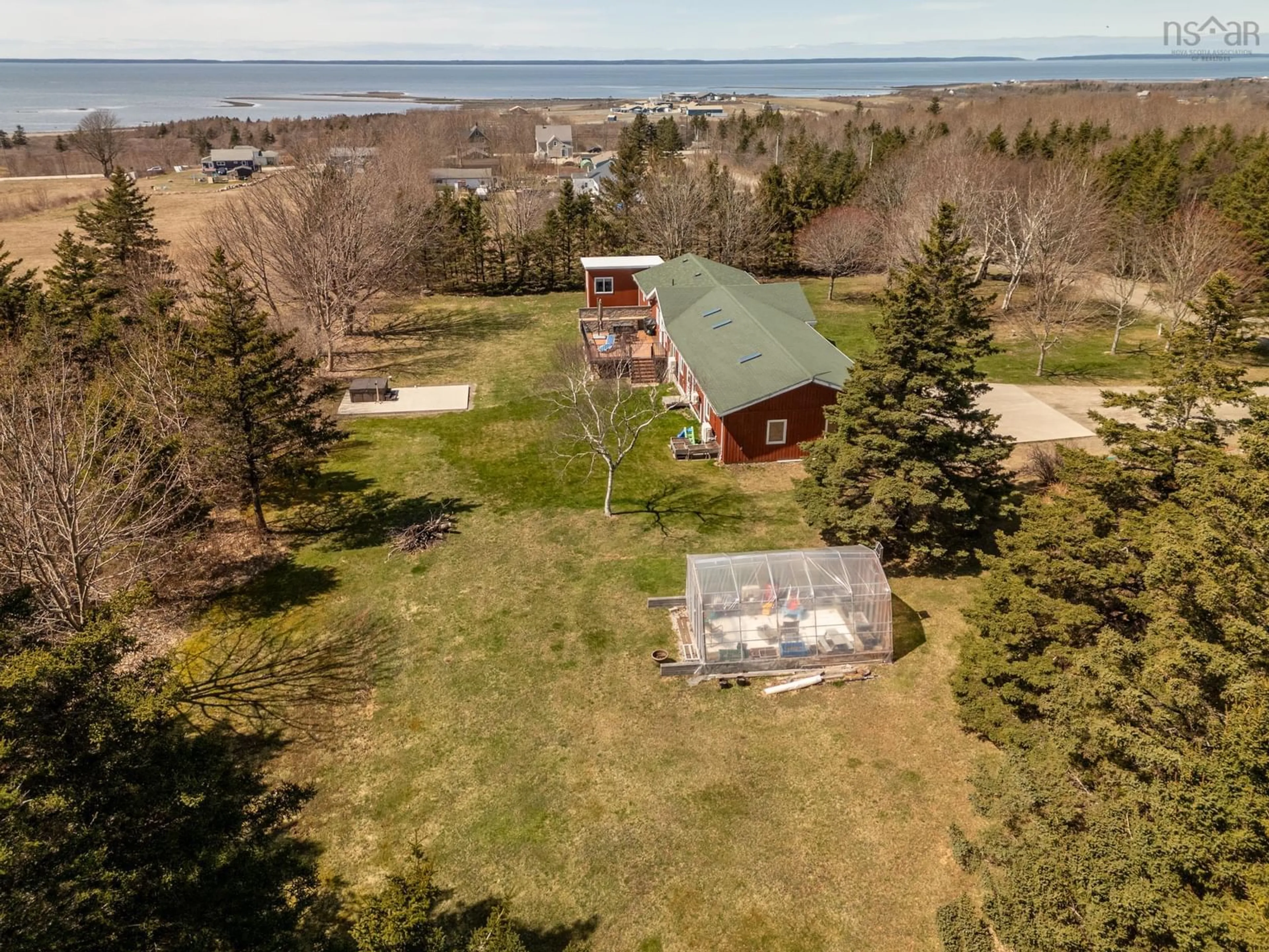 A pic from outside/outdoor area/front of a property/back of a property/a pic from drone, water/lake/river/ocean view for 180 John Thibodeau Rd, Meteghan Centre Nova Scotia B0W 2K0