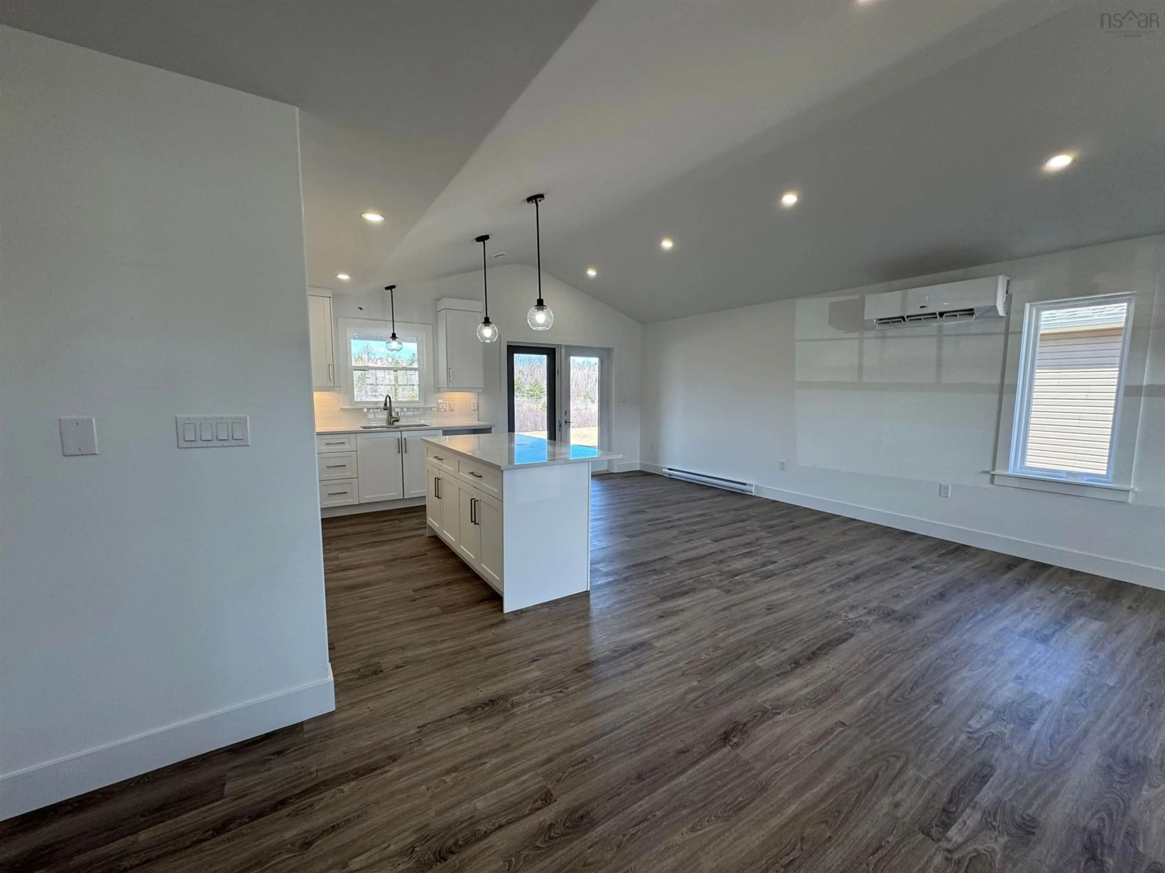 Open concept kitchen, wood/laminate floor for 88 Thistle St, Falmouth Nova Scotia B0N 2T0