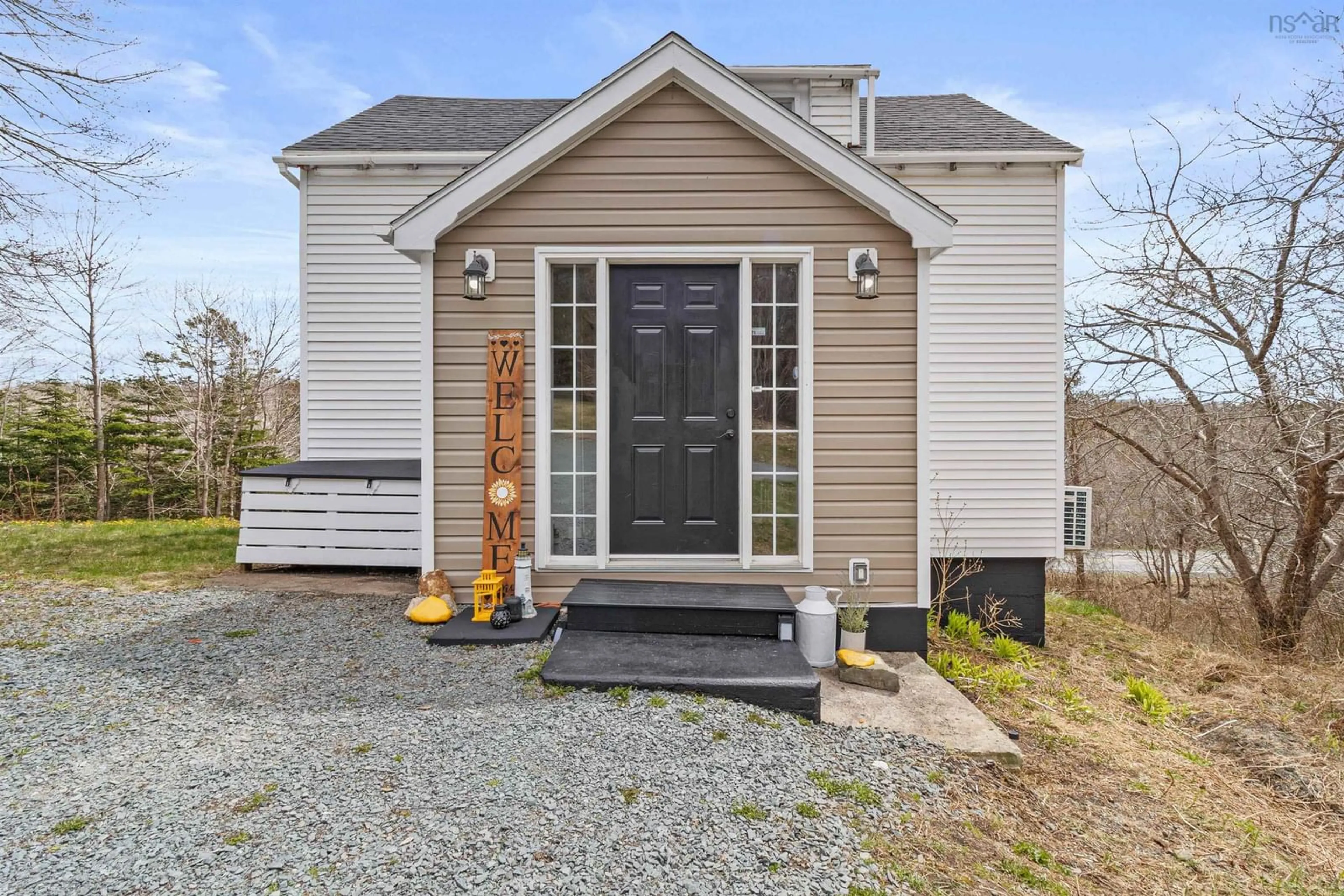 Home with vinyl exterior material, street for 3375 Prospect Rd, Whites Lake Nova Scotia B3T 1Z3