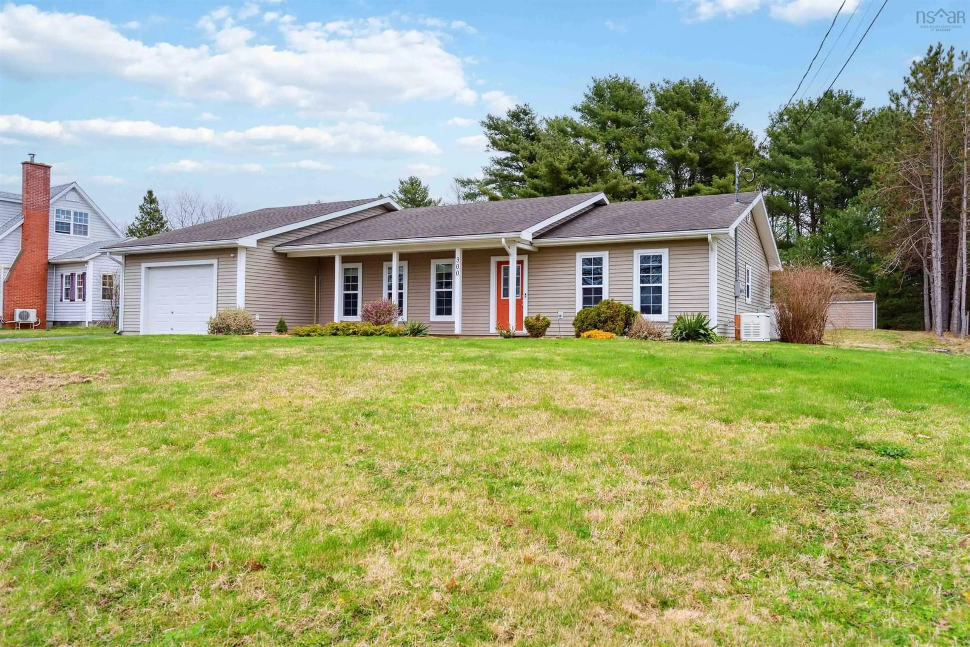 Home with vinyl exterior material, street for 300 Brookside Dr, Kingston Nova Scotia B0P 1R0