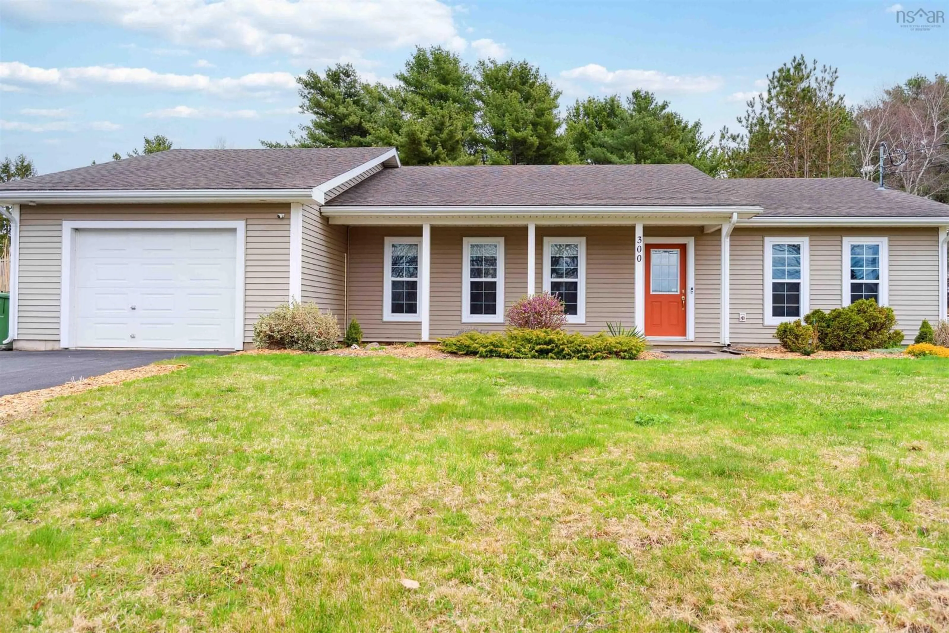 Home with vinyl exterior material, street for 300 Brookside Dr, Kingston Nova Scotia B0P 1R0