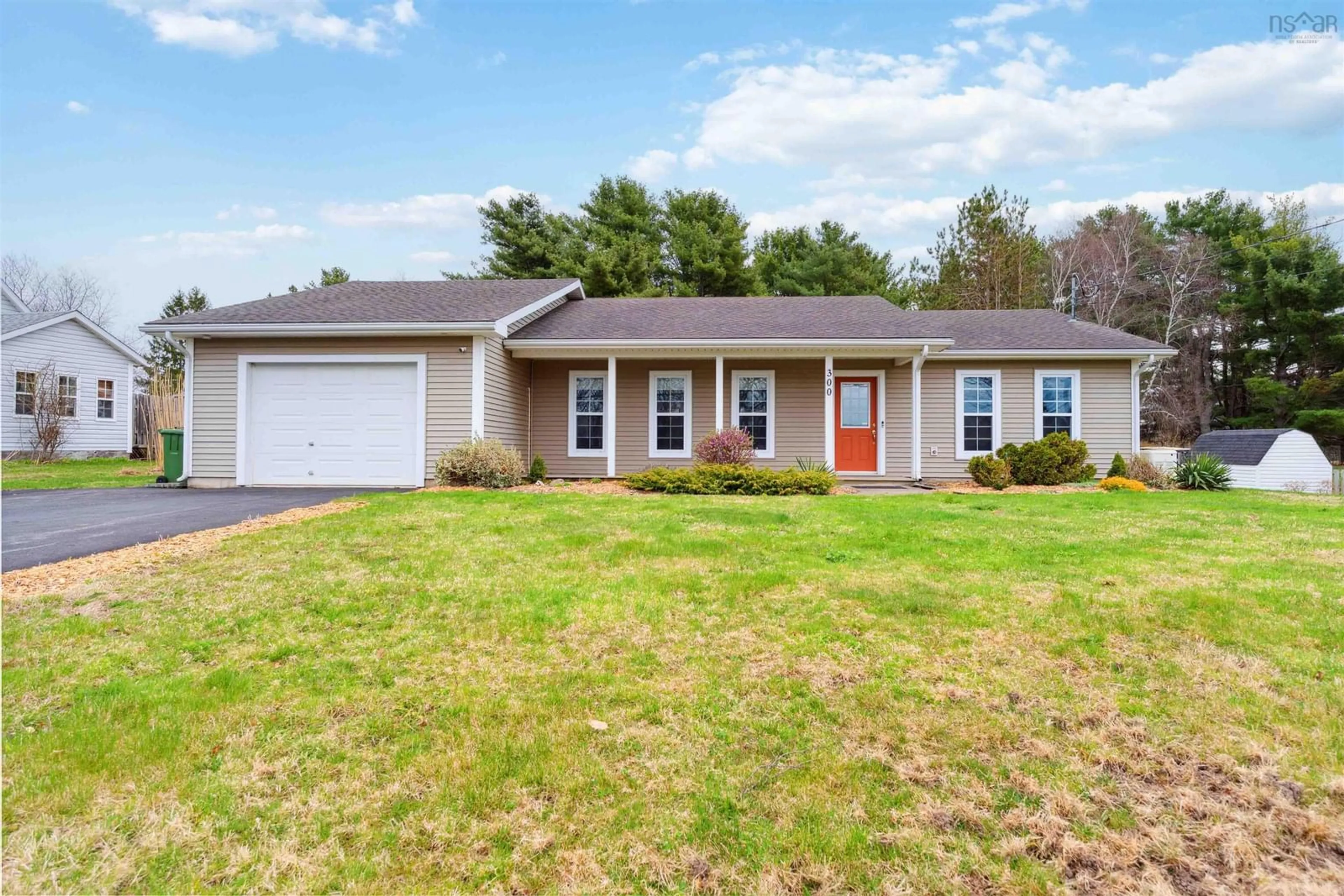 Home with vinyl exterior material, street for 300 Brookside Dr, Kingston Nova Scotia B0P 1R0