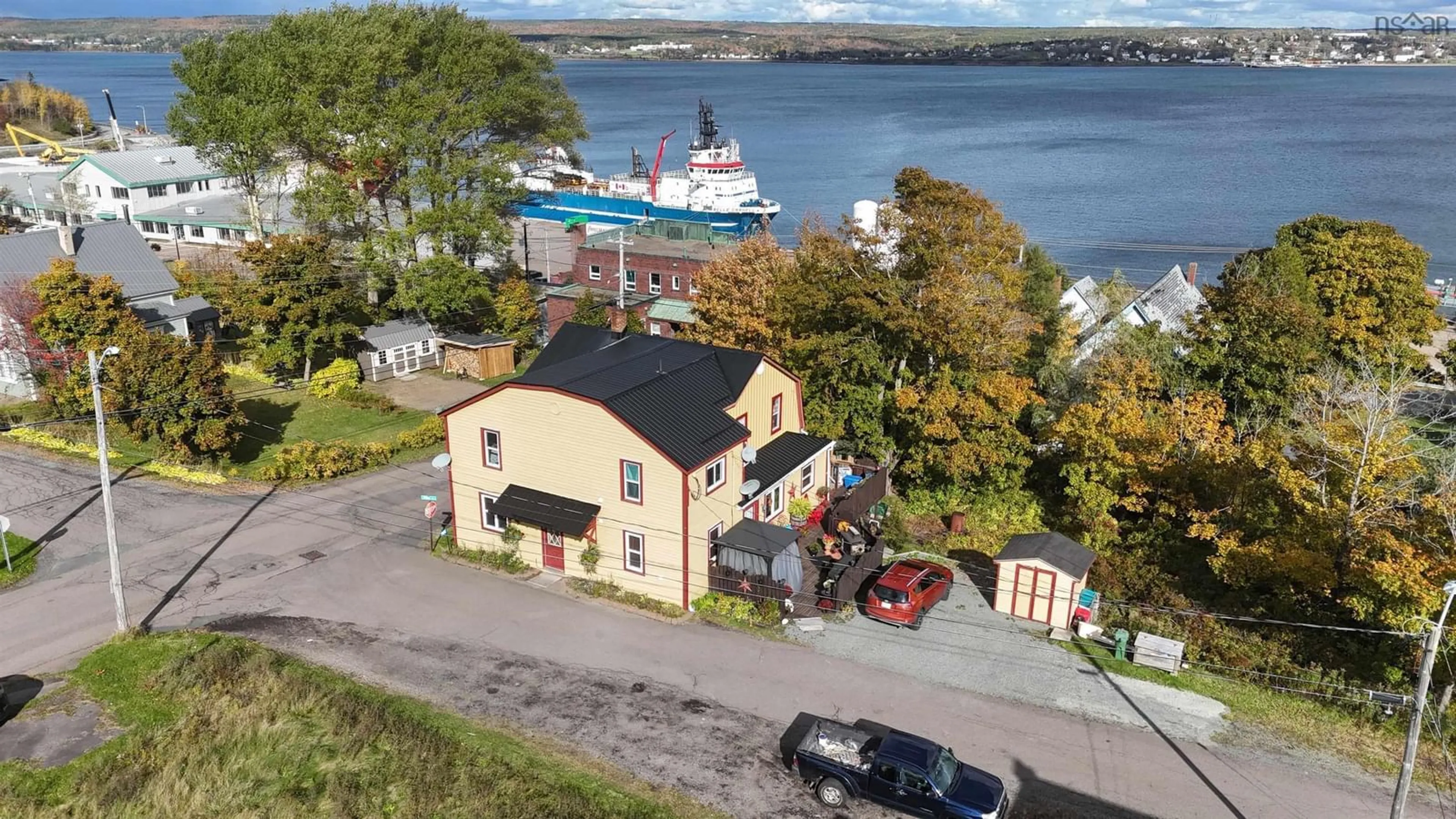 A pic from outside/outdoor area/front of a property/back of a property/a pic from drone, water/lake/river/ocean view for 436 Wylde St, Mulgrave Nova Scotia B0E 2G0