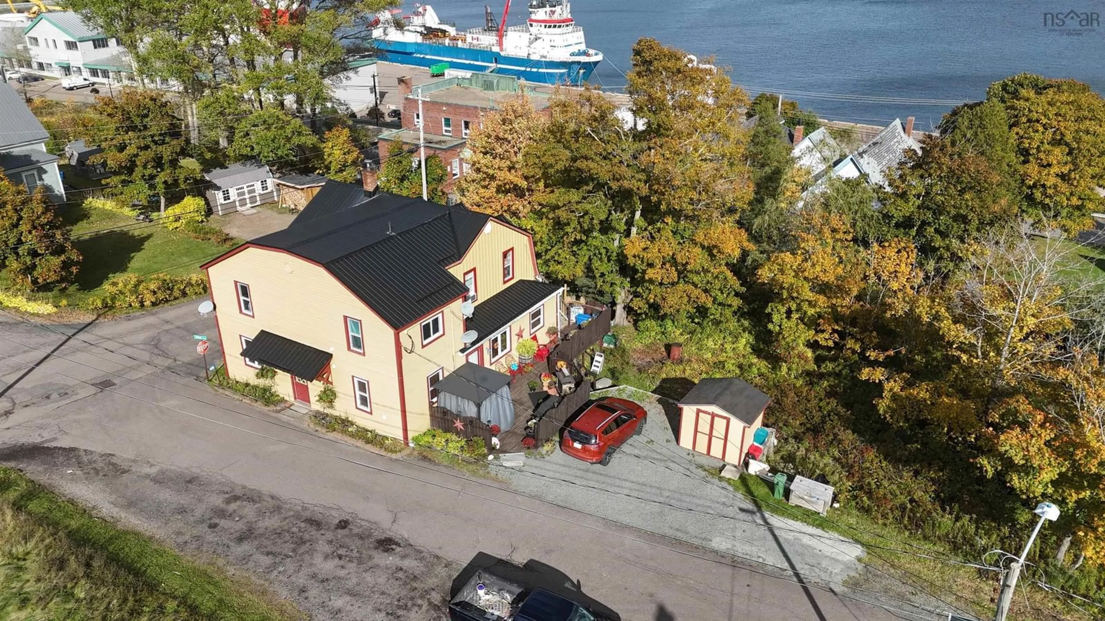 A pic from outside/outdoor area/front of a property/back of a property/a pic from drone, unknown for 436 Wylde St, Mulgrave Nova Scotia B0E 2G0