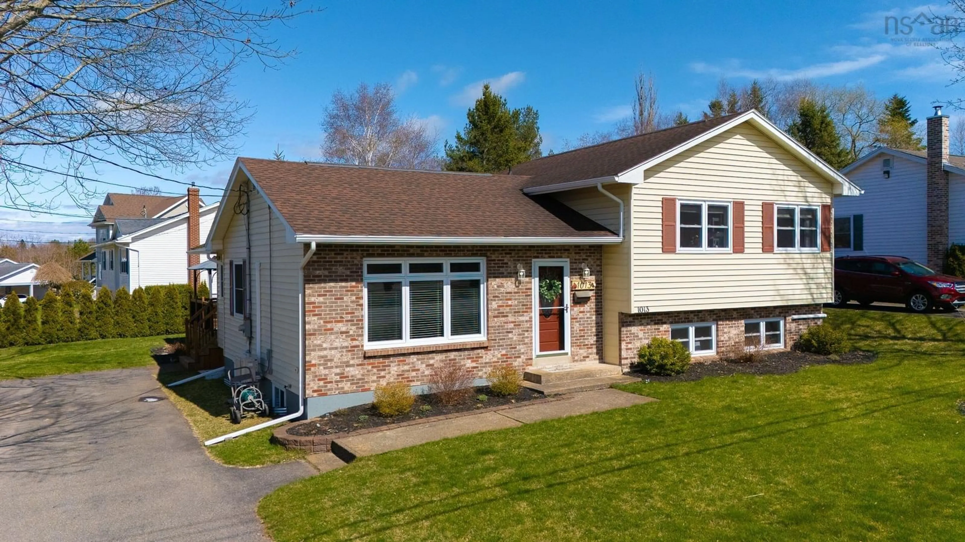 Home with vinyl exterior material, street for 1013 Country Club Blvd, New Minas Nova Scotia B4N 4W9
