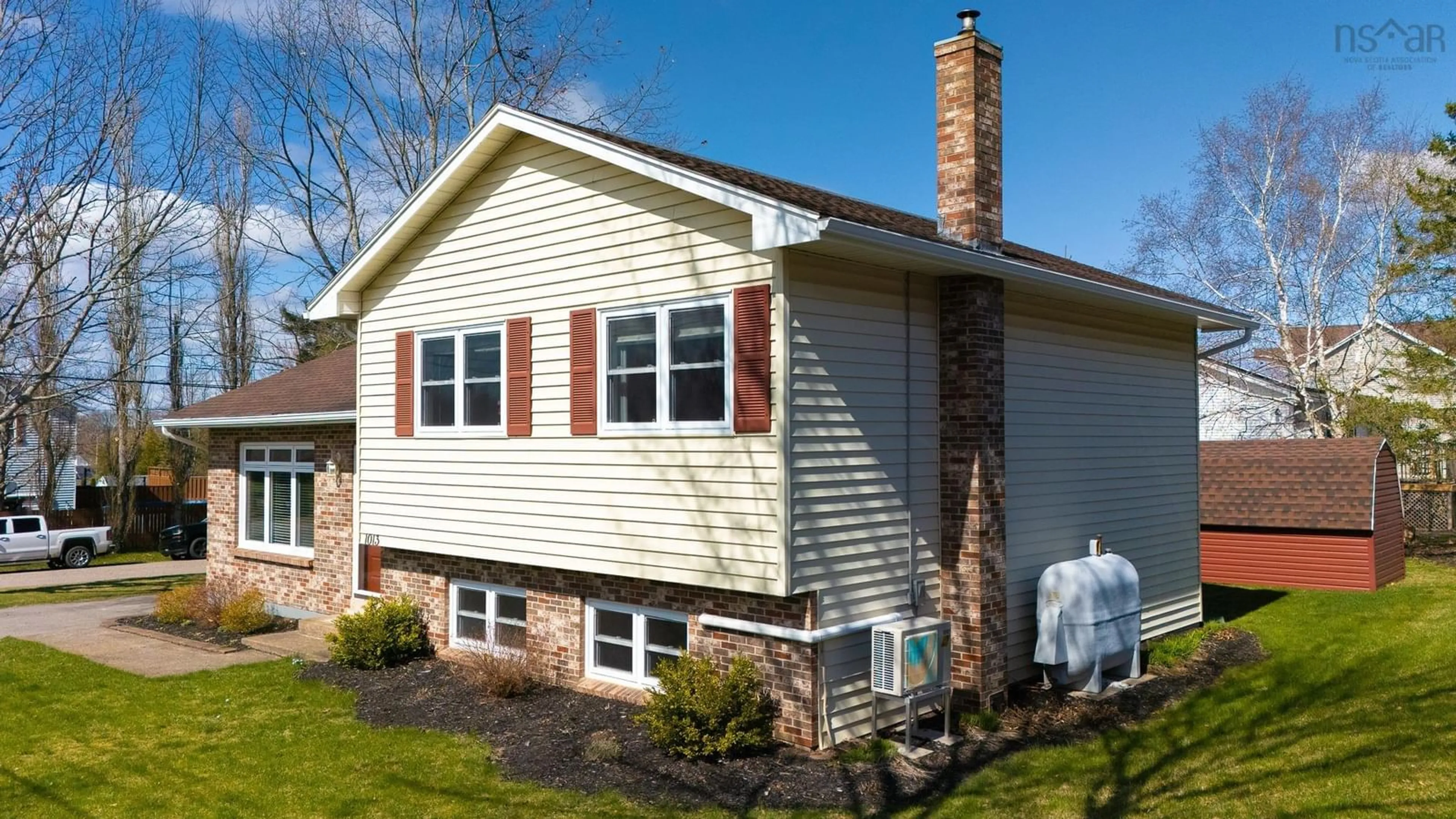 Home with vinyl exterior material, street for 1013 Country Club Blvd, New Minas Nova Scotia B4N 4W9